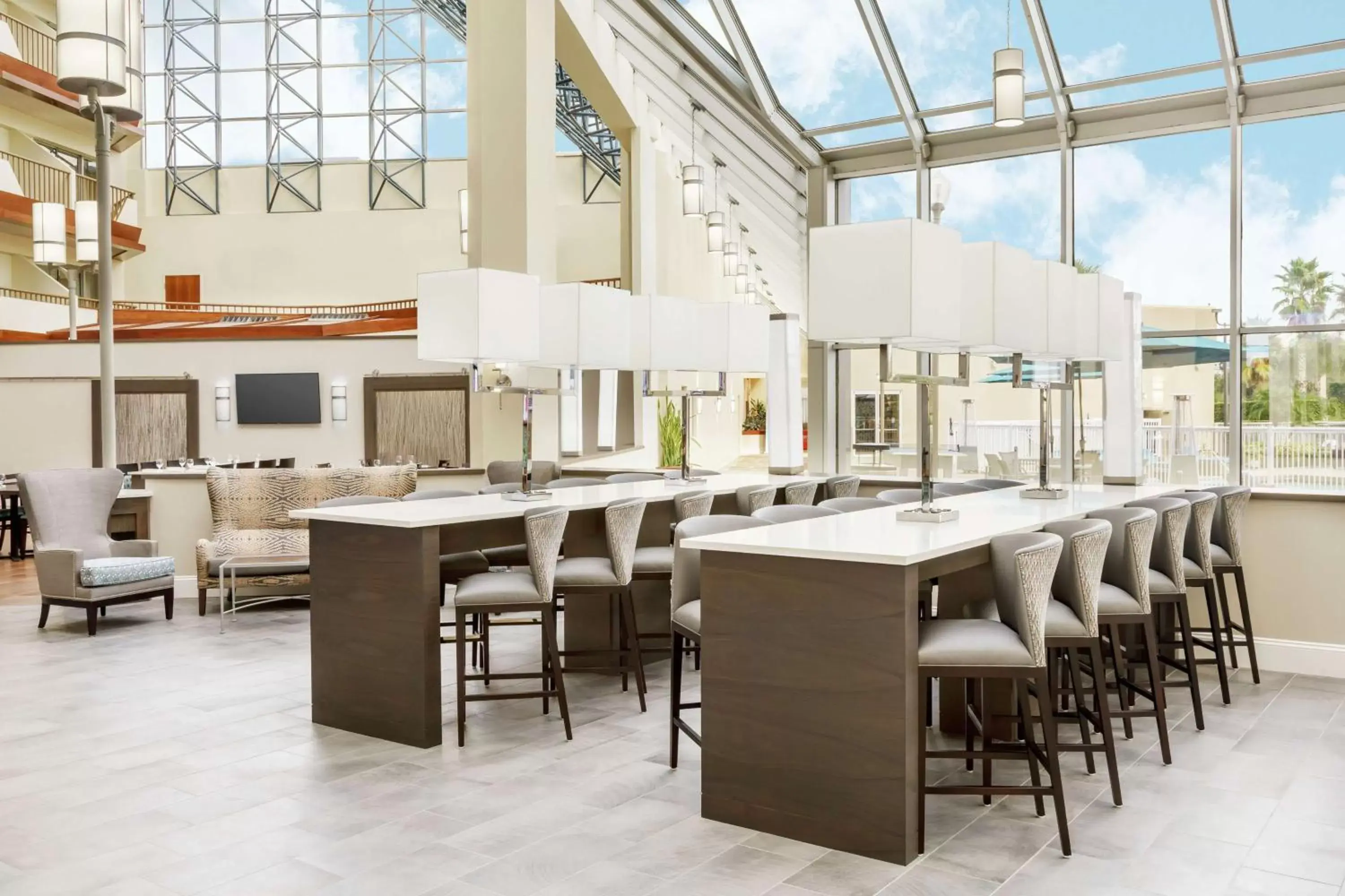 Lobby or reception, Restaurant/Places to Eat in DoubleTree by Hilton Orlando Airport Hotel