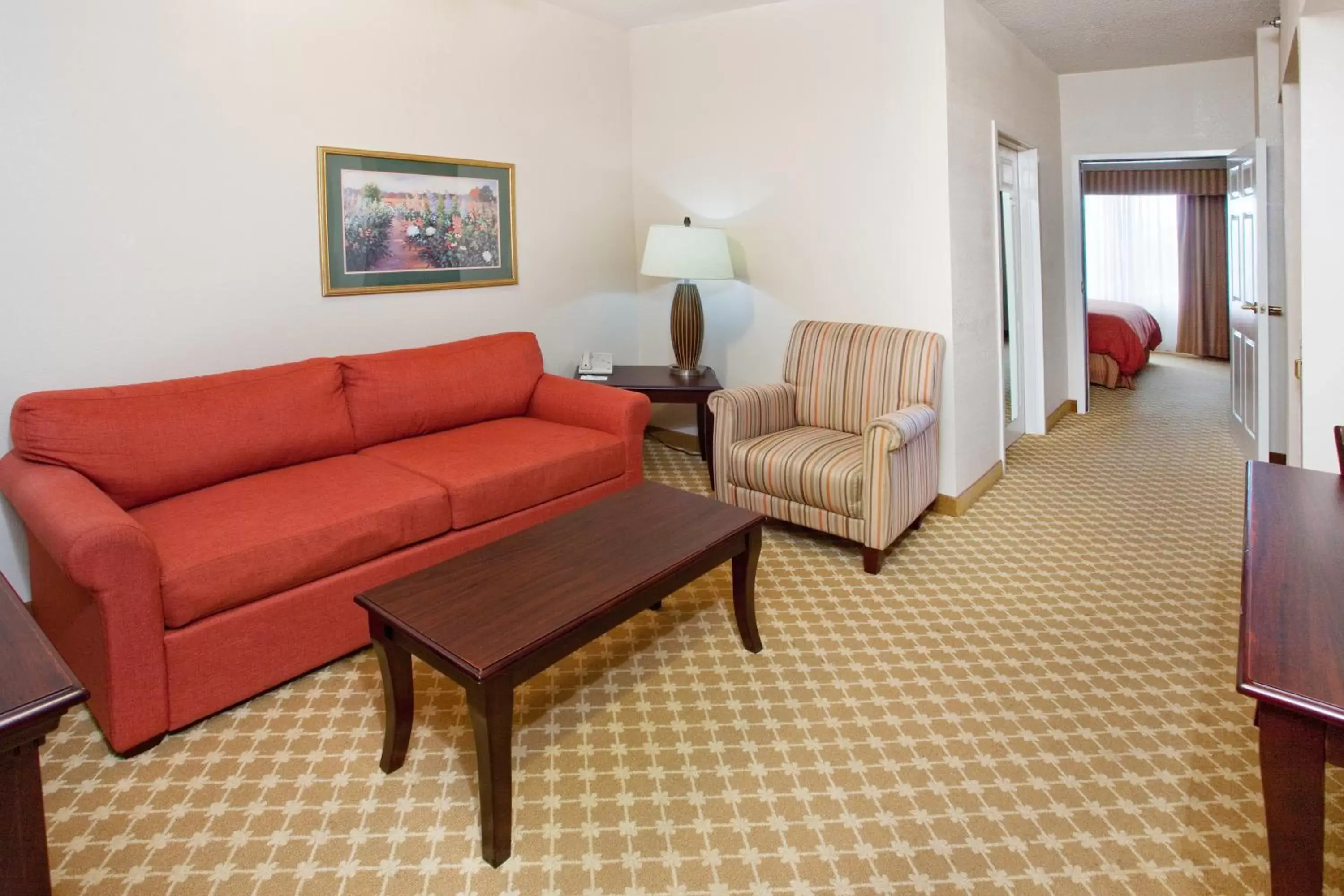 Living room, Seating Area in Country Inn & Suites by Radisson, Columbus, GA