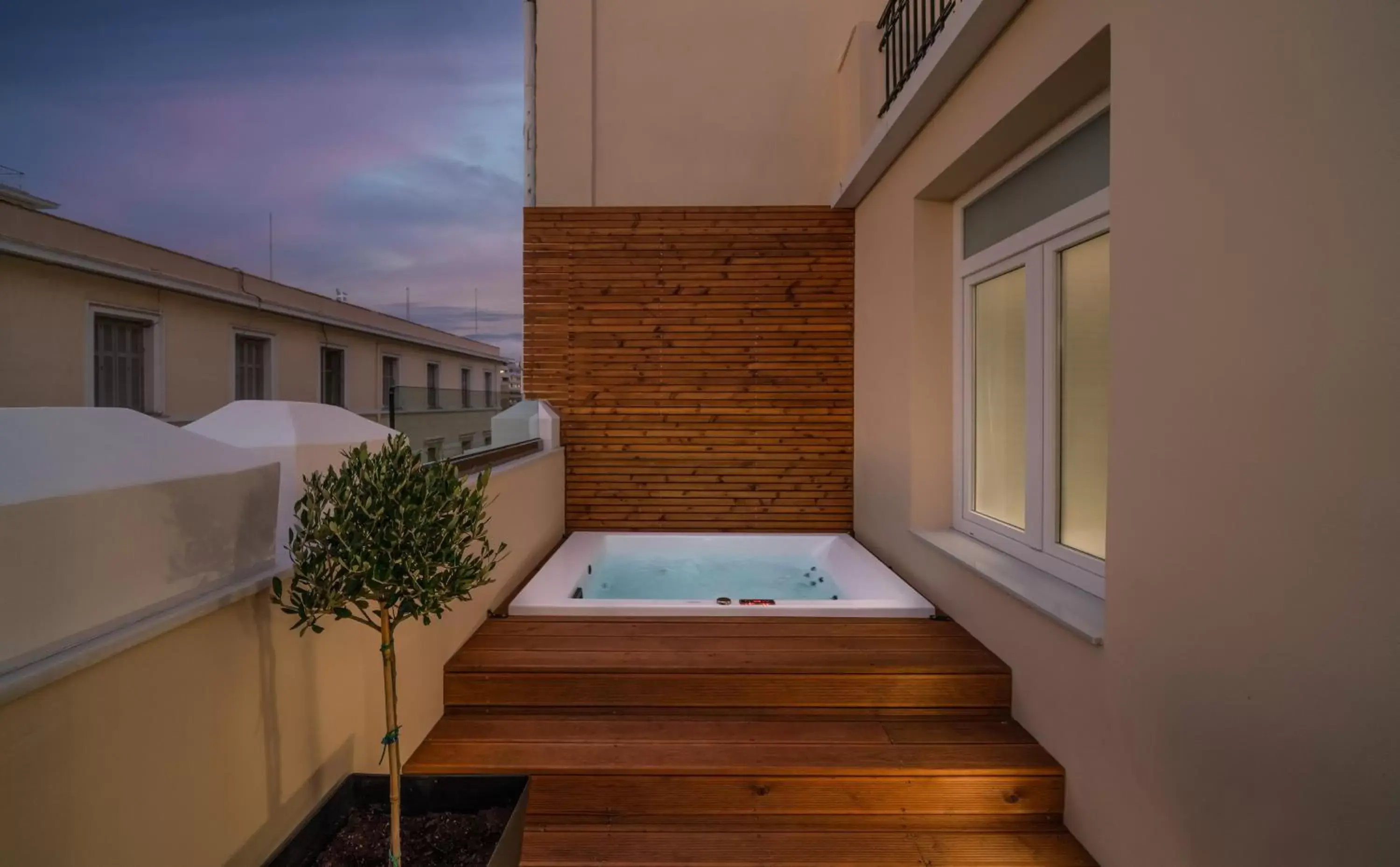 Hot Tub, Swimming Pool in Praxitelous Luxury Suites