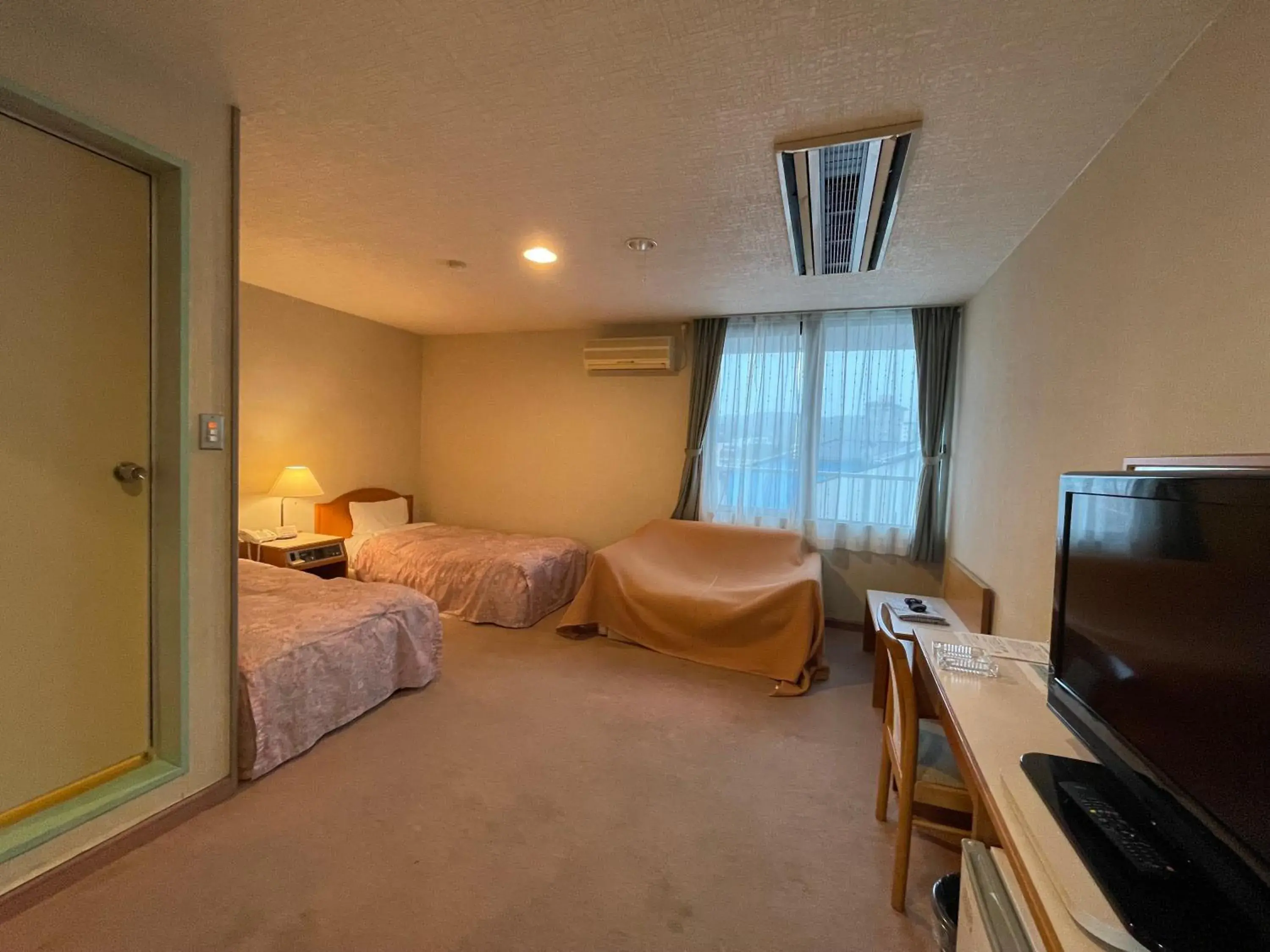 Photo of the whole room, TV/Entertainment Center in Hotel Ginsui