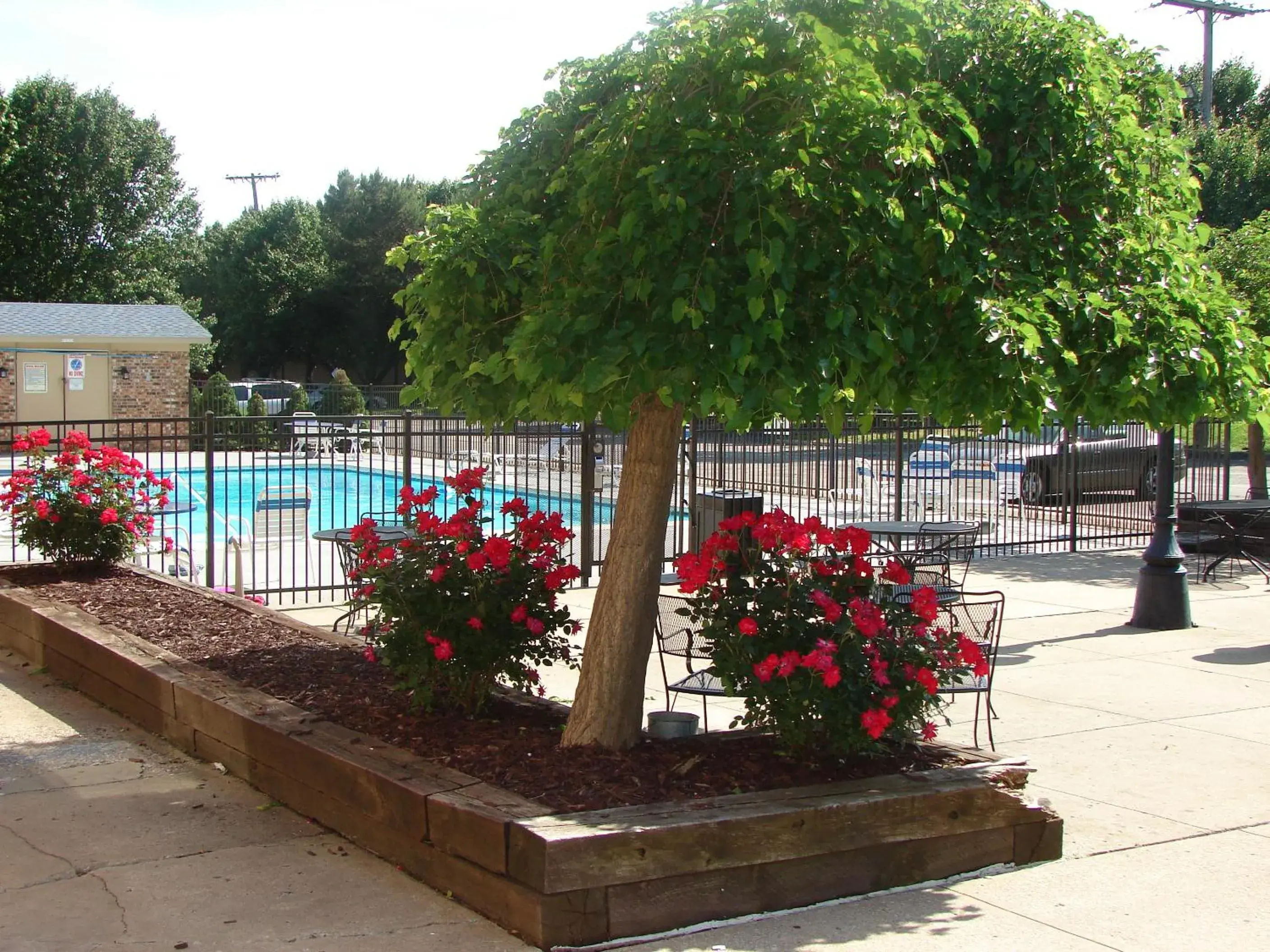 Patio, Pool View in American Inn North Kansas City