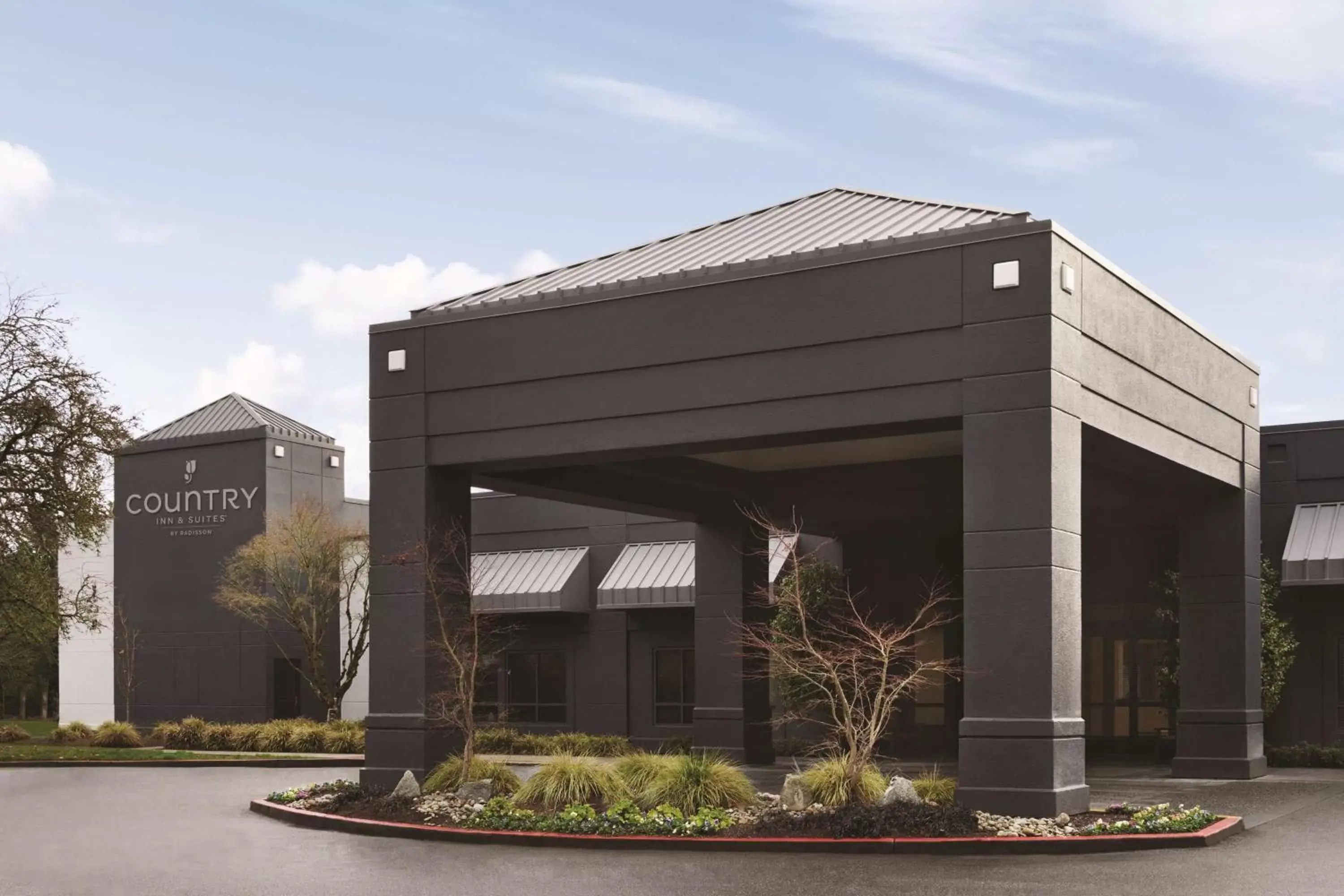 Property building in Country Inn & Suites by Radisson, Seattle-Bothell, WA