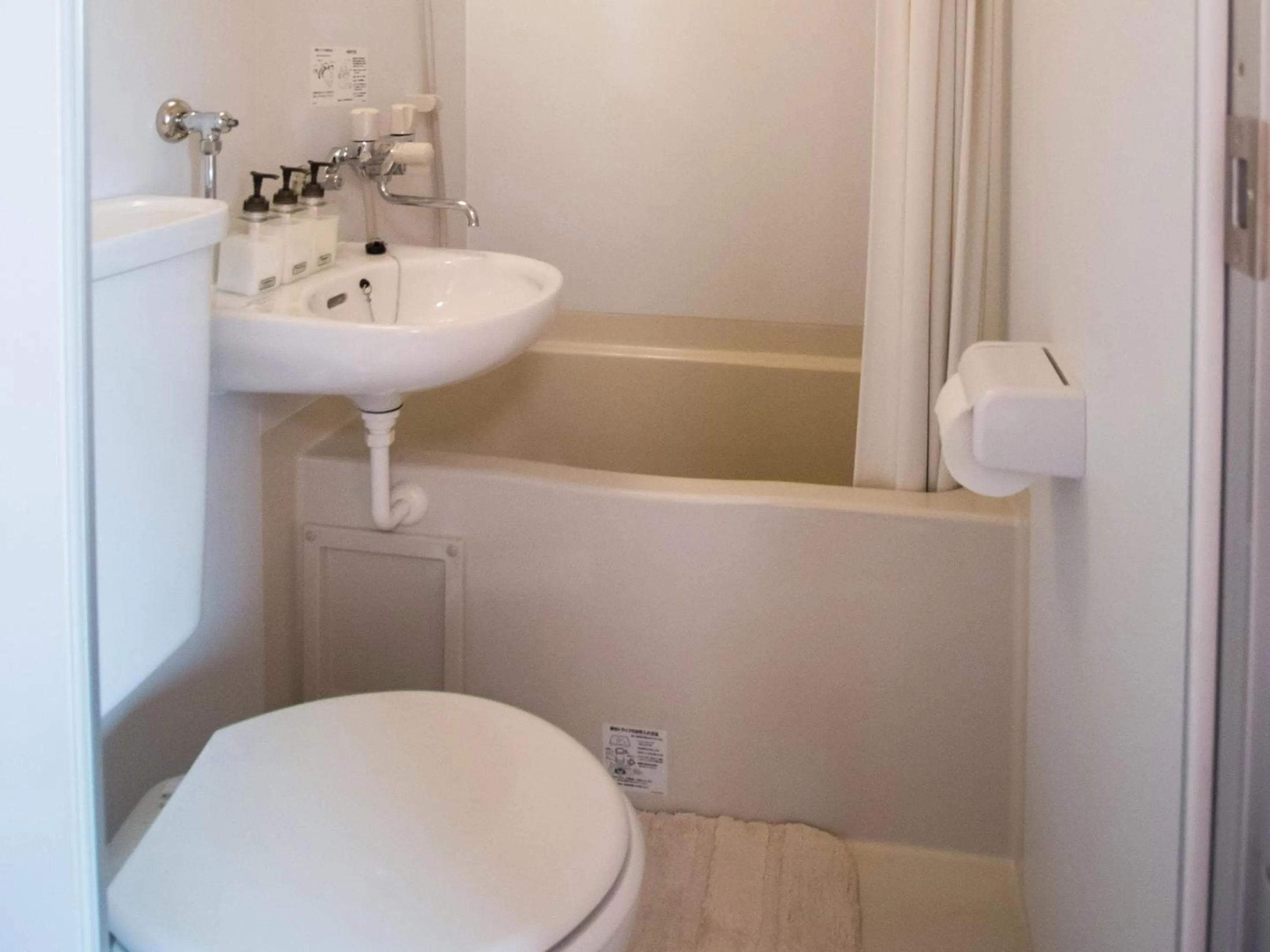 Toilet in Brick House Furano