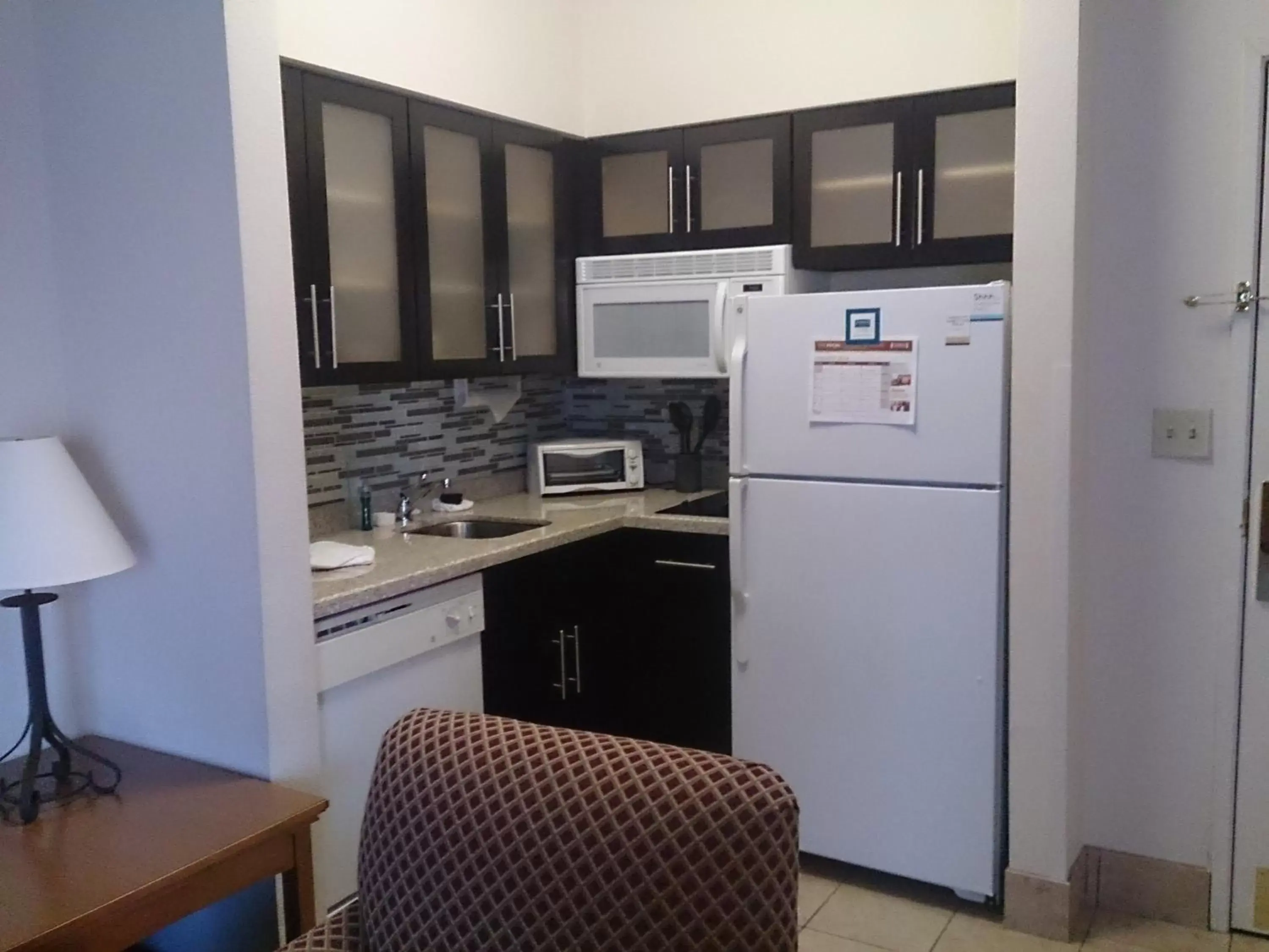 Photo of the whole room, Kitchen/Kitchenette in Staybridge Suites Columbus-Airport, an IHG Hotel