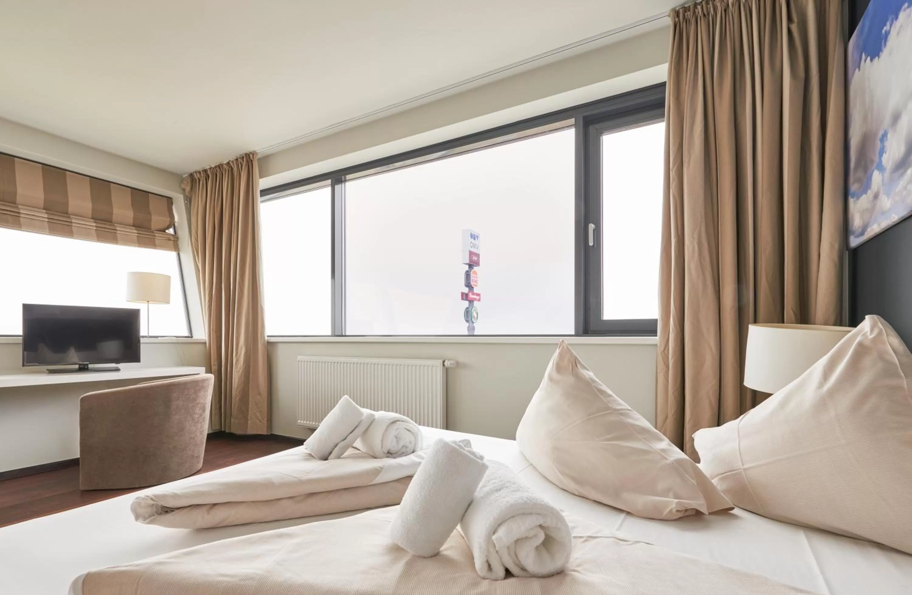 Bed in Rosenberger Seminar-Hotel Deutsch-Wagram