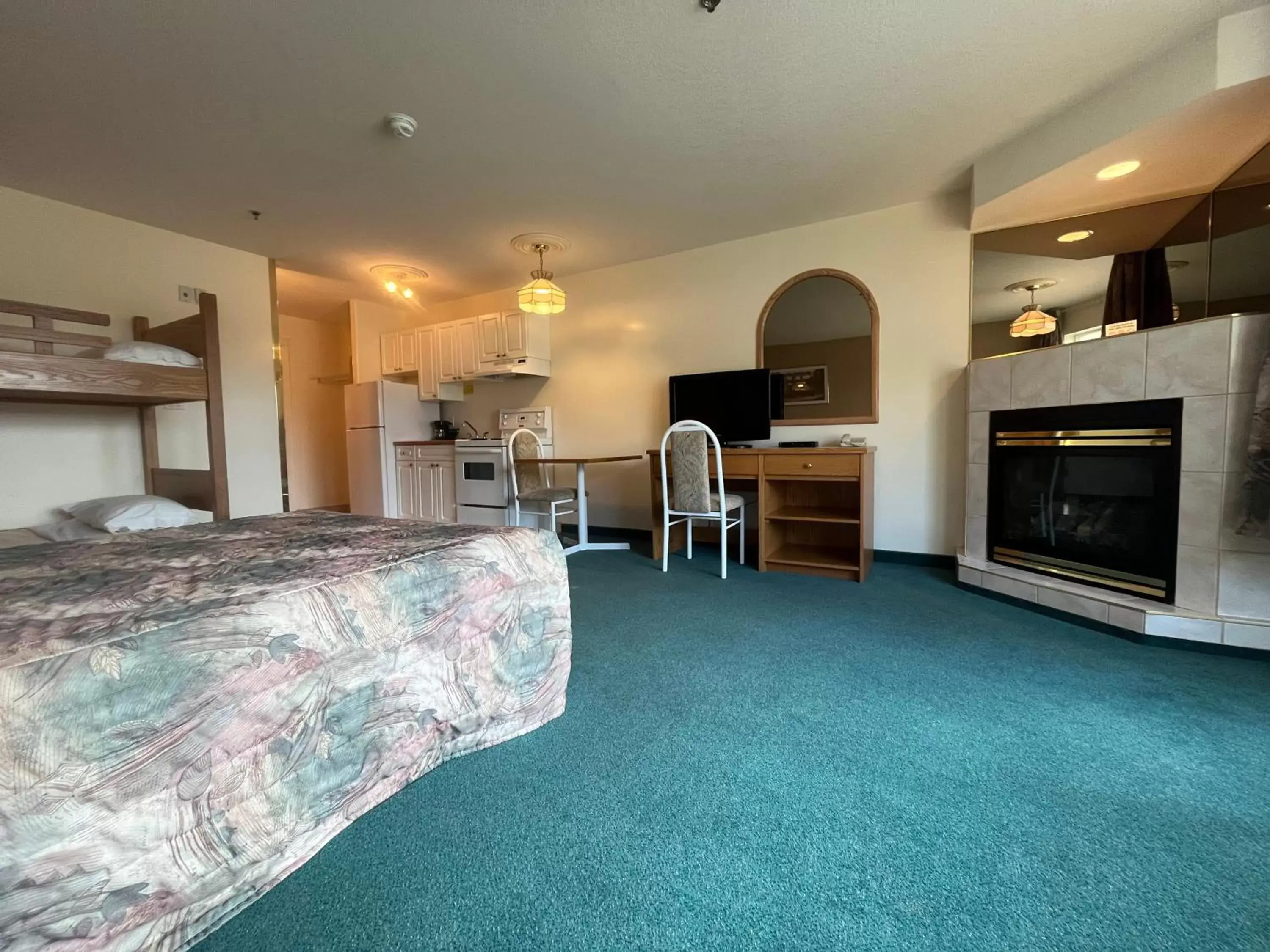 Bed, Seating Area in Western Budget Motel #3 Whitecourt