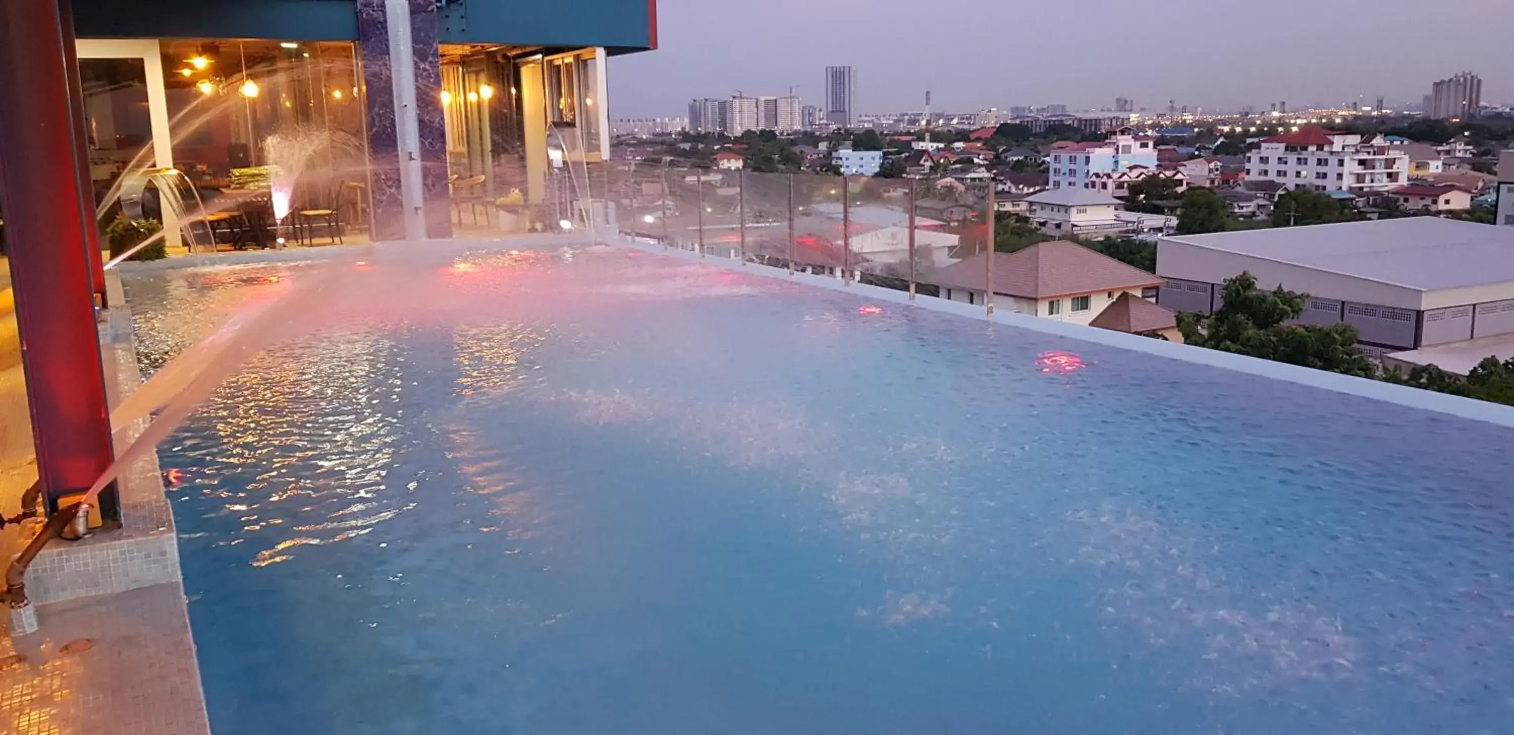Patio, Swimming Pool in BlueTel Re'sidencE Bangkok IMPACT- 1 Time Drop-Off Service to IMPACT