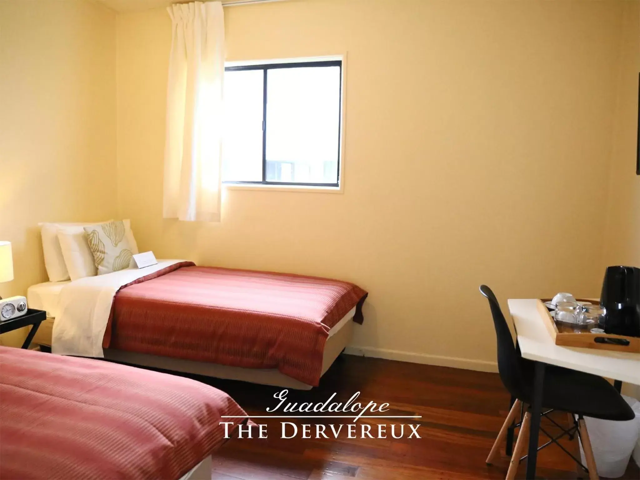 Bed in The Devereux Boutique Hotel