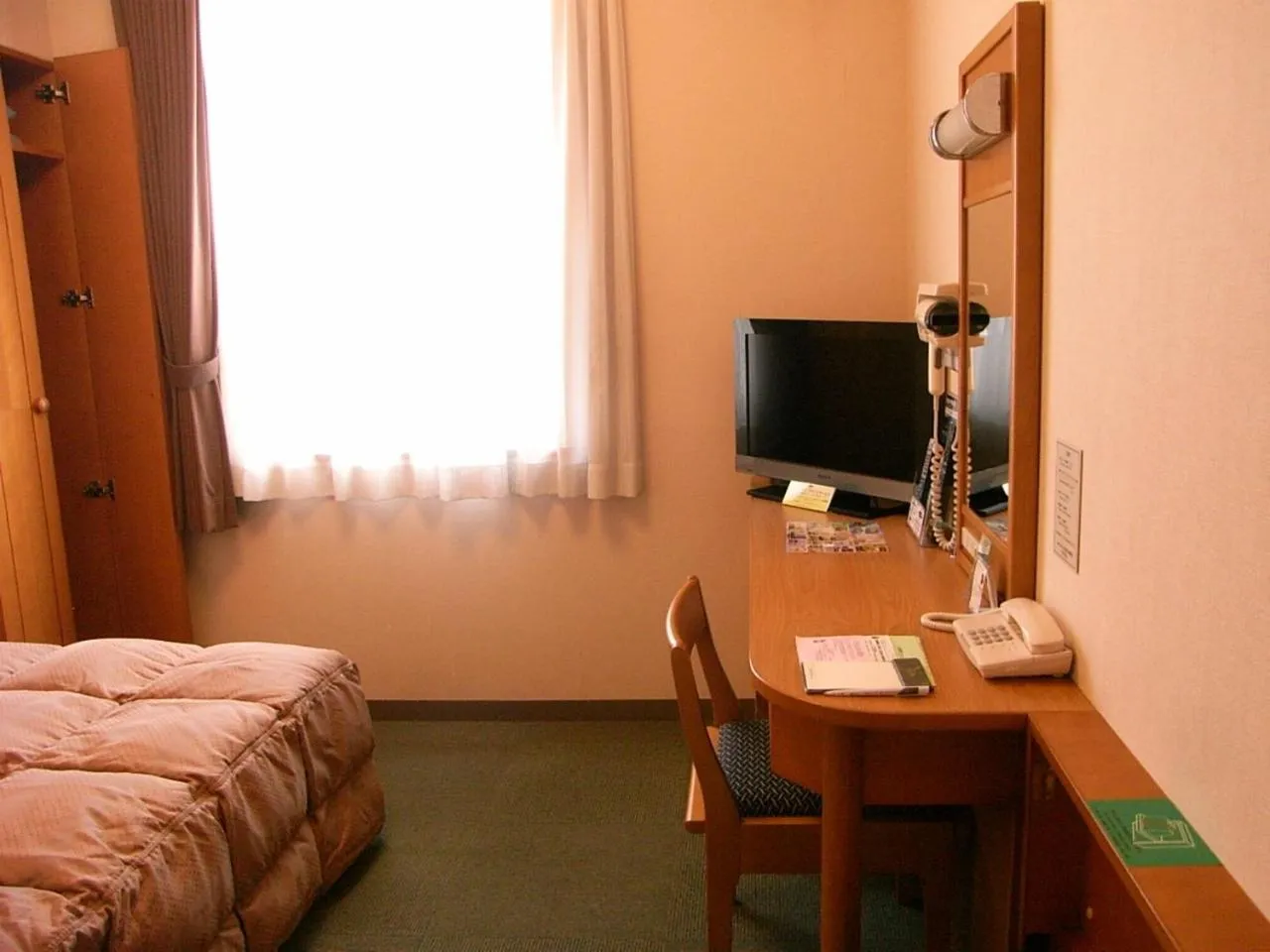 Photo of the whole room, Bed in Hotel Route-Inn Aso Kumamoto Airport Ekimae