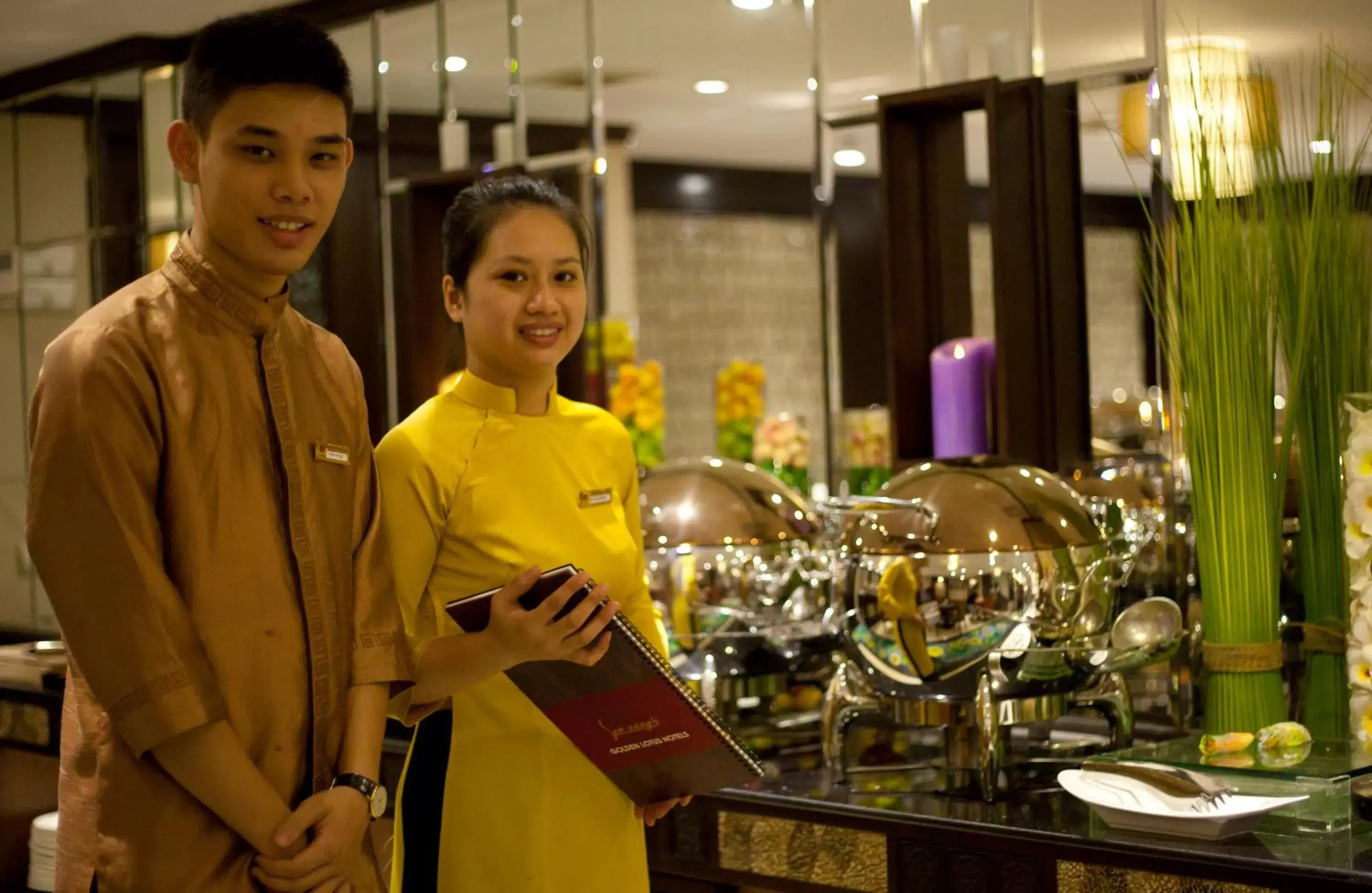 Staff in Golden Lotus Luxury Hotel