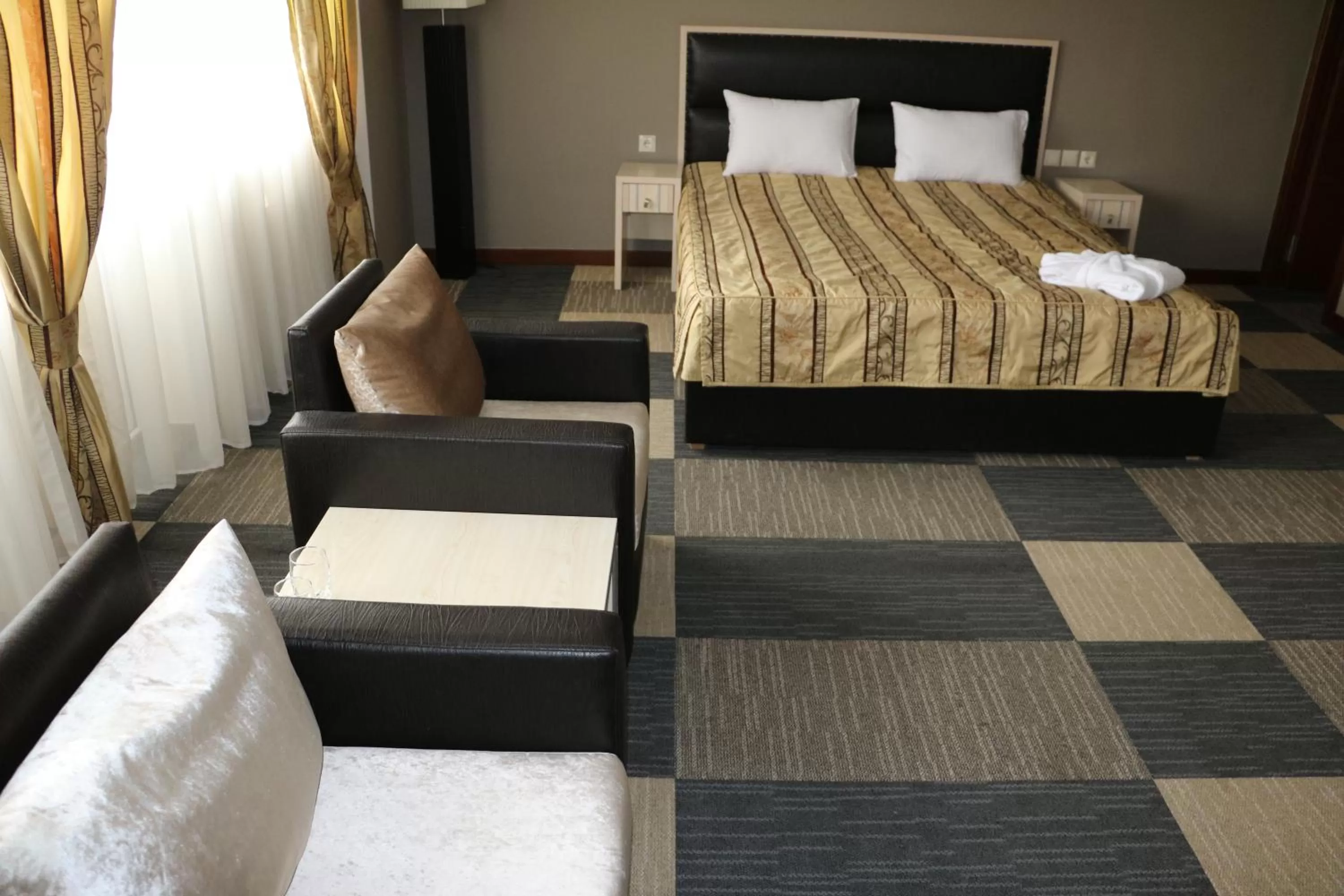 TV and multimedia, Bed in Aktau Hotel