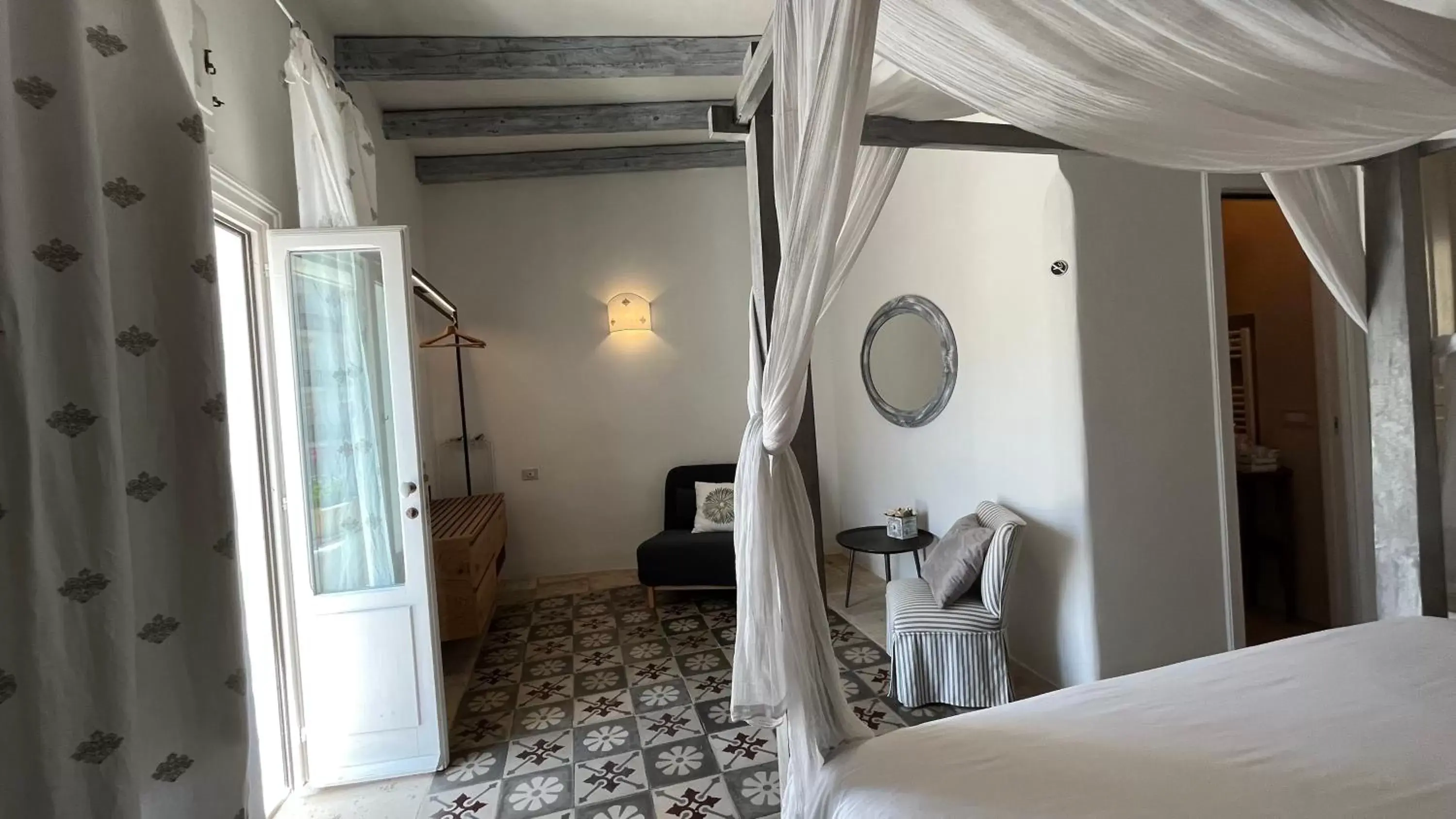 Bed in Antico Mondo Rooms & Suites