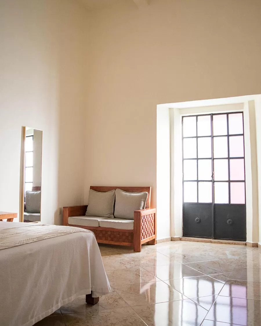 Bed, Seating Area in Hotel Catedral