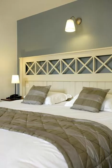 Bed in Logis Hotel, restaurant et spa Le Relais De Broceliande