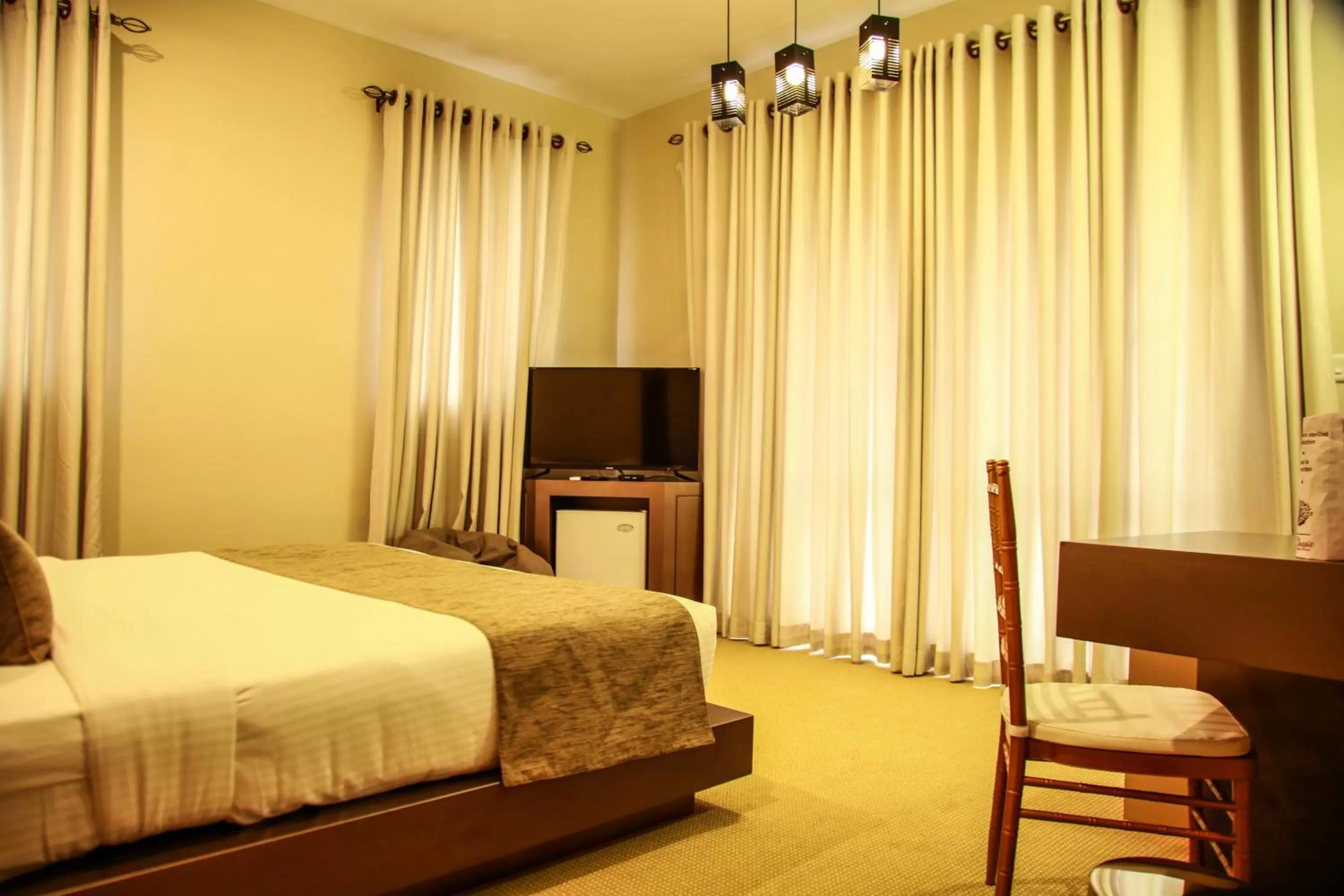 Bedroom, TV/Entertainment Center in Royal Classic Resort