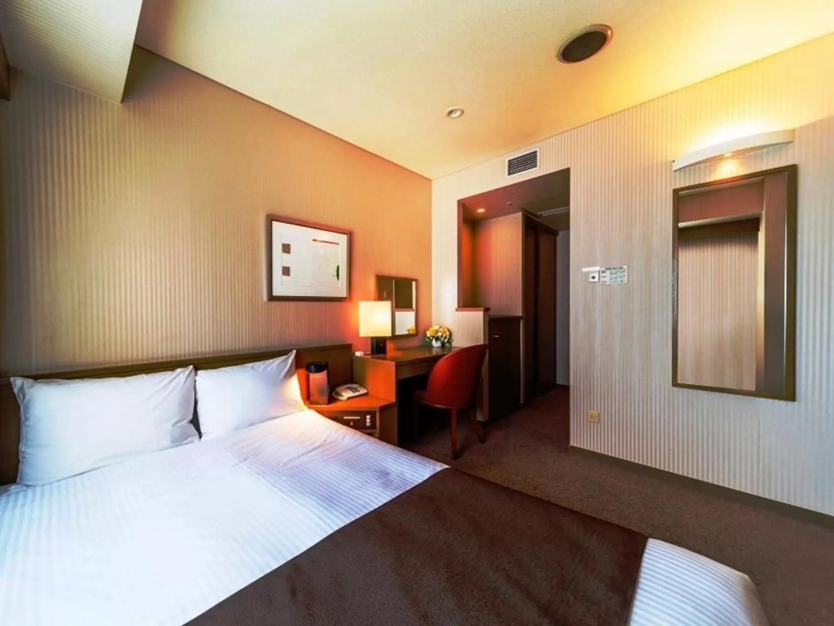 Photo of the whole room, Bed in Nest Hotel Sapporo Odori