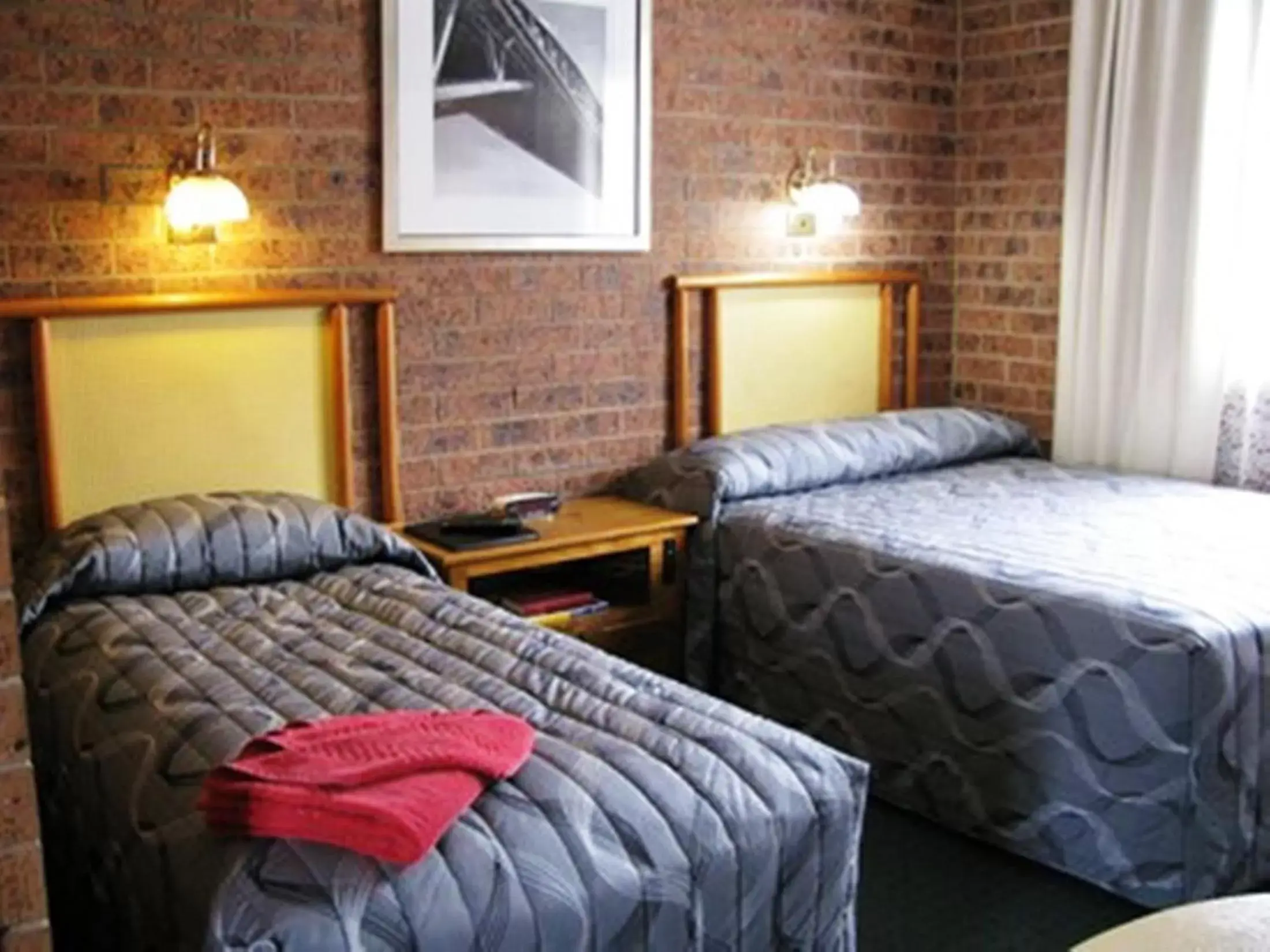 Bed in The Wayfarer Motel Bed in The Wayfarer Motel