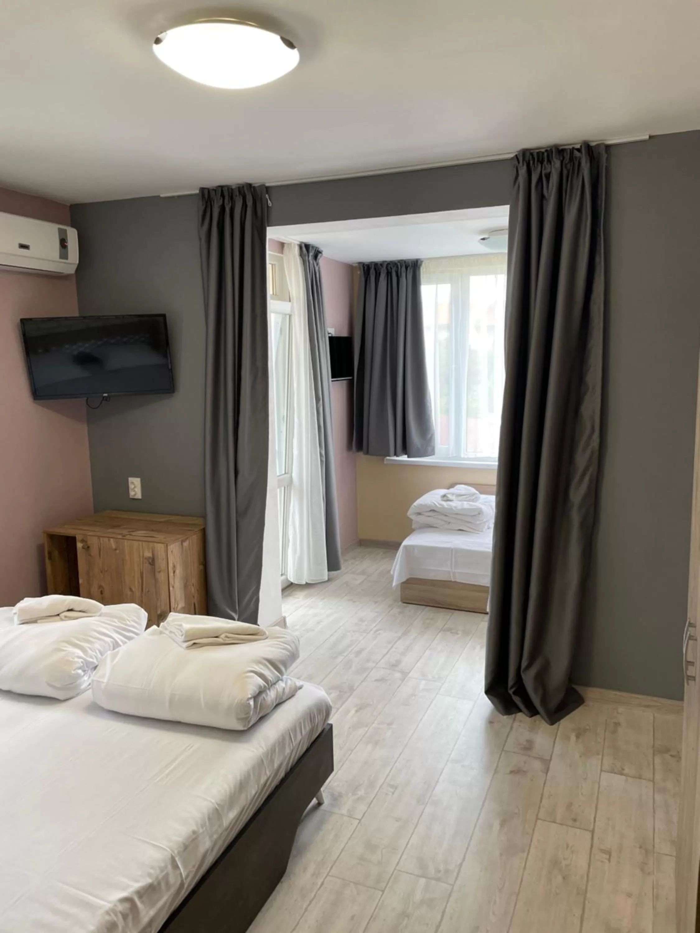 Bed in Family Hotel Malibu