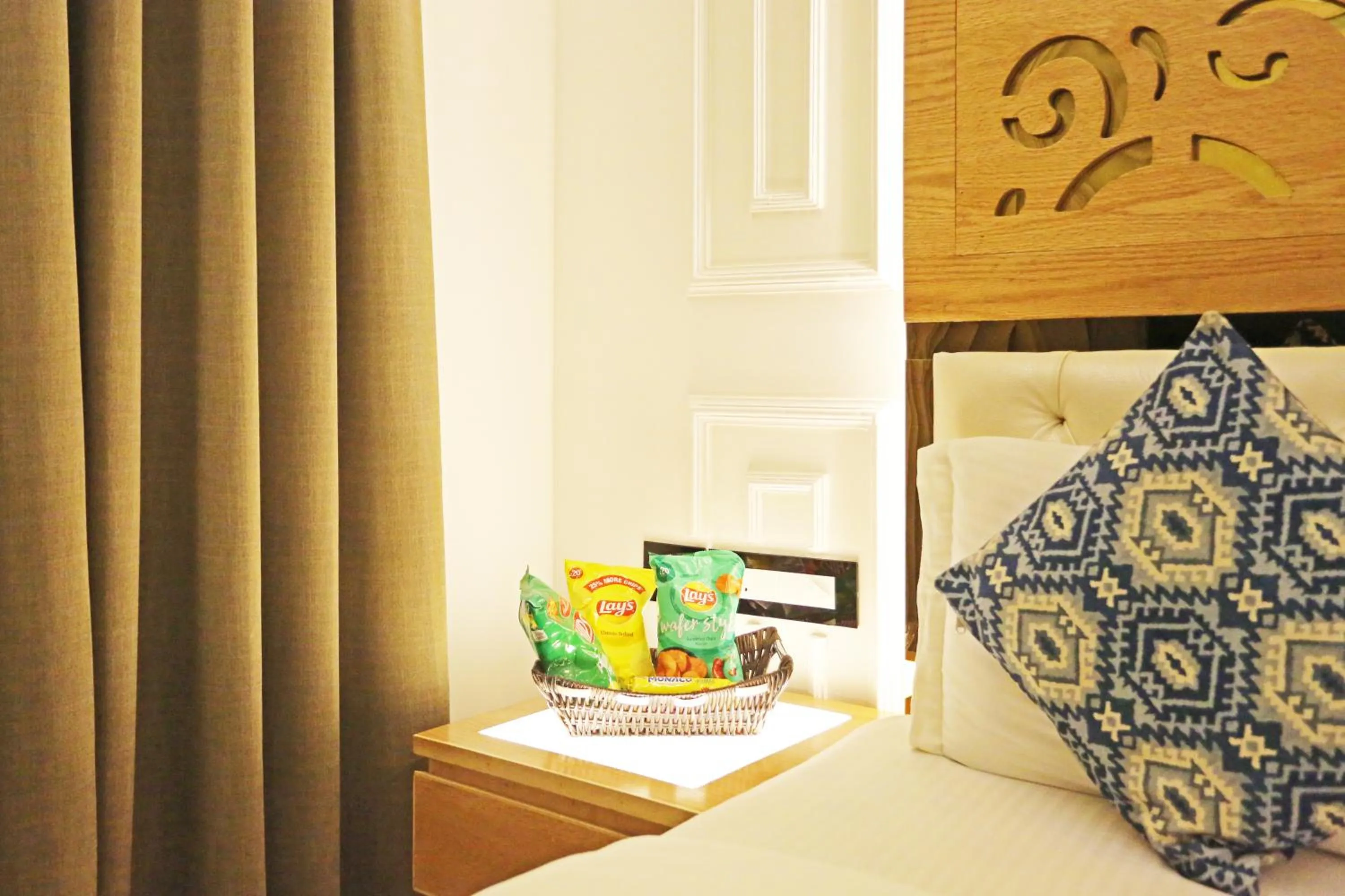 Bed in JRD Luxury-Business Hotel