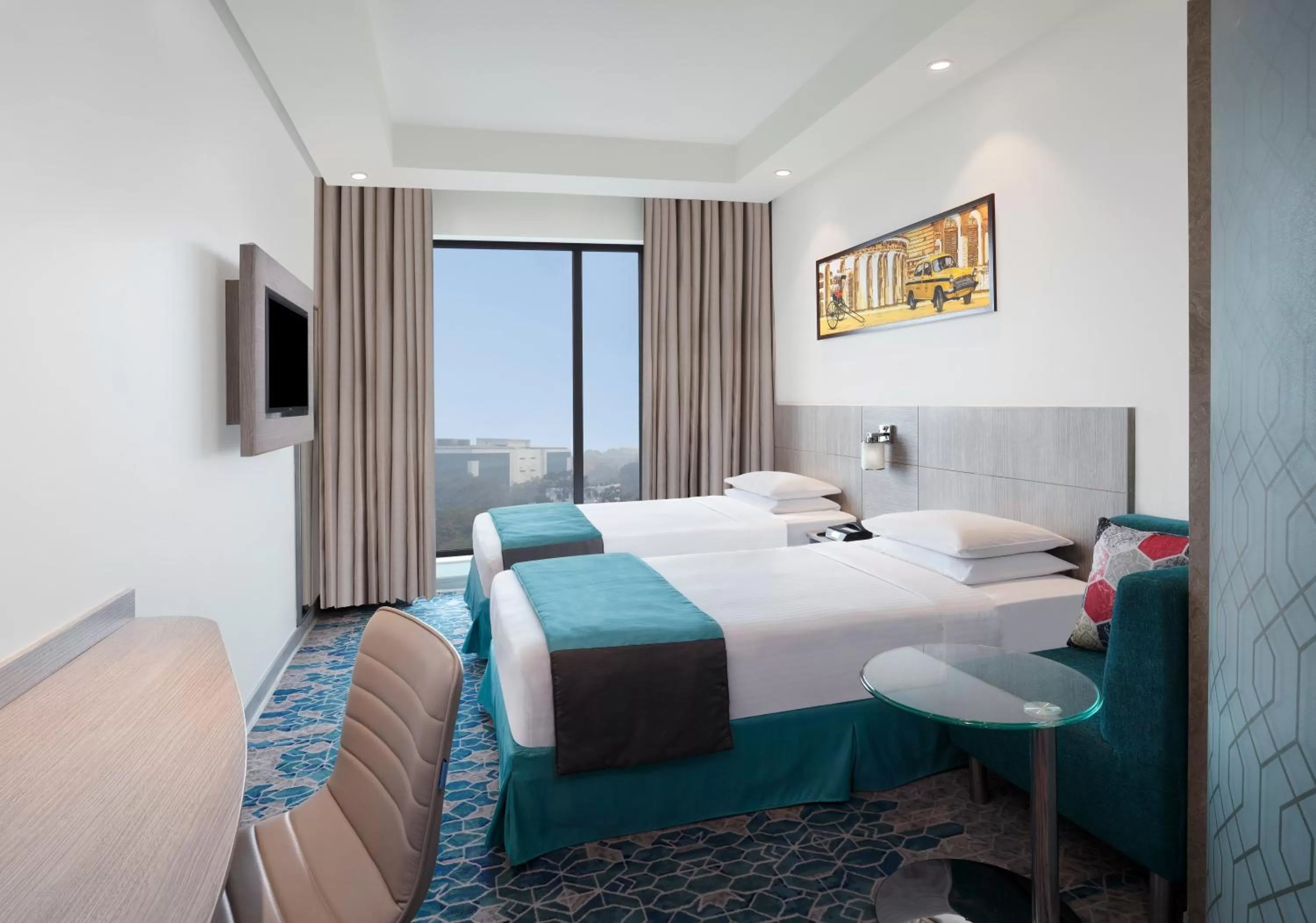 Photo of the whole room, Bed in Holiday Inn Express Kolkata Airport by IHG