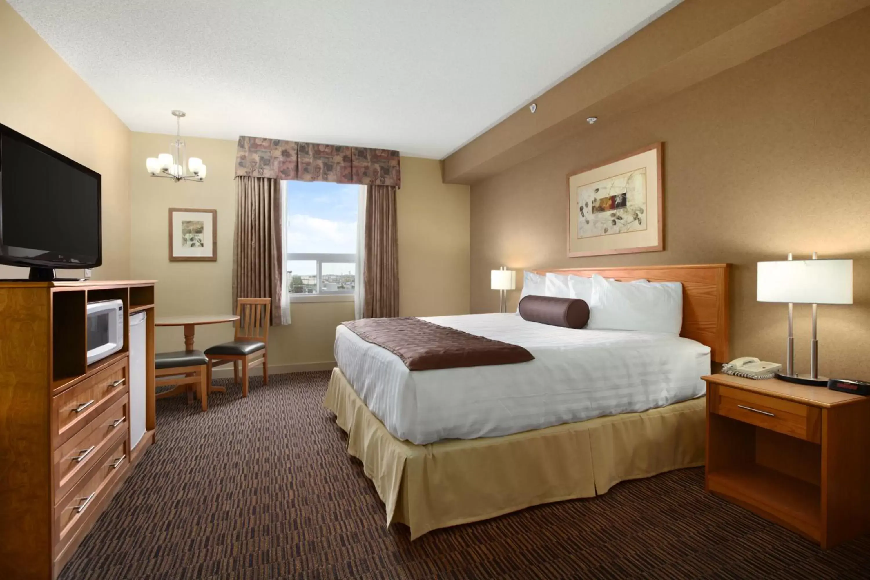 Photo of the whole room, Bed in Days Inn & Suites by Wyndham West Edmonton