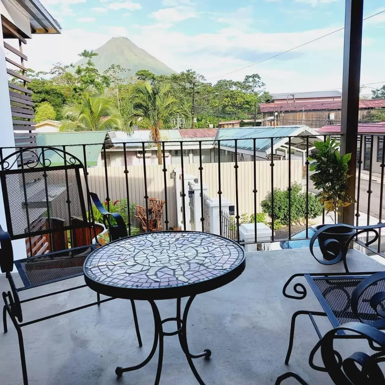 Balcony/Terrace in La Fortuna Lodge by Treebu Hotels