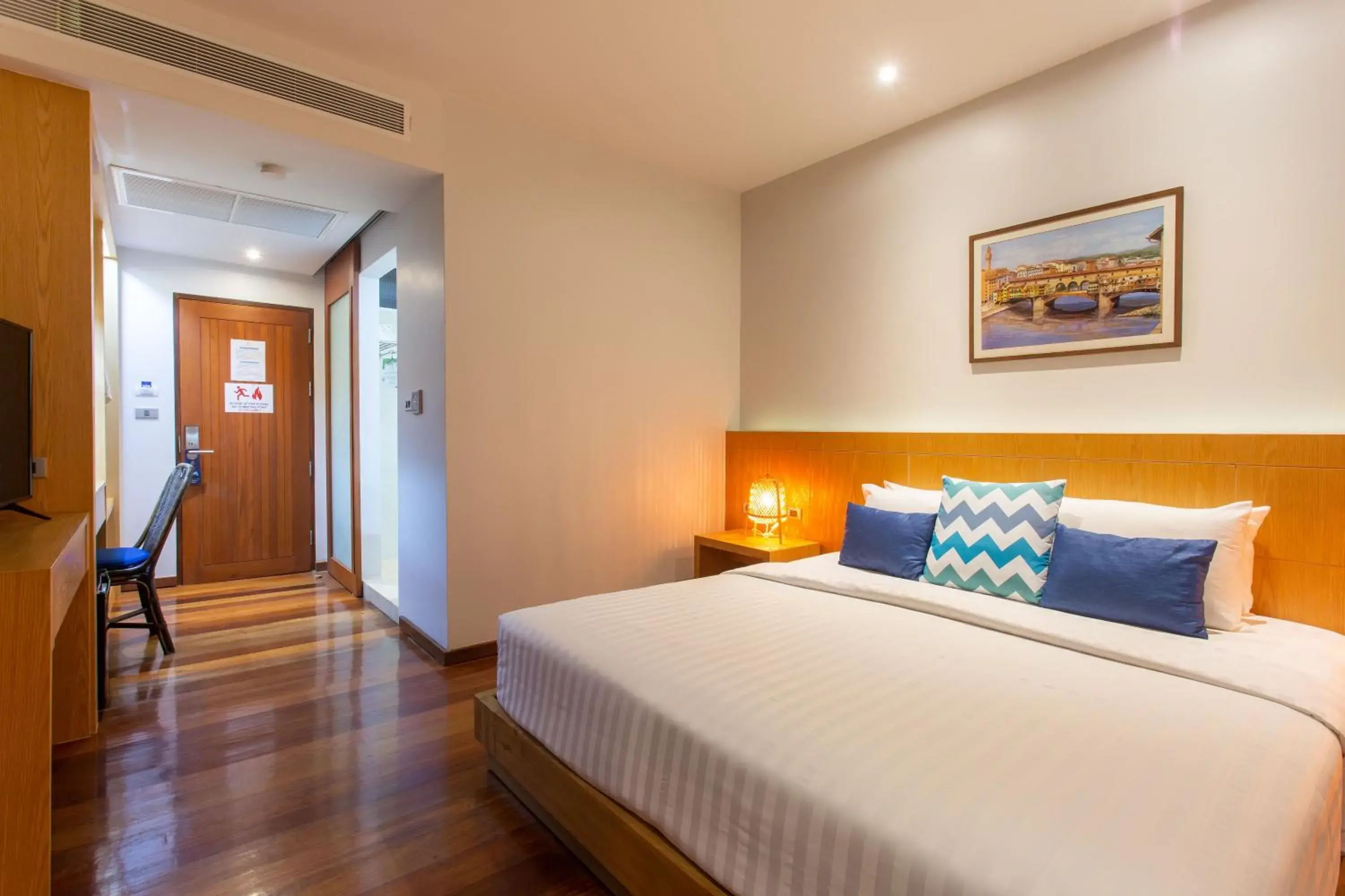 Bed in Coral Cliff Beach Resort Samui - SHA Plus