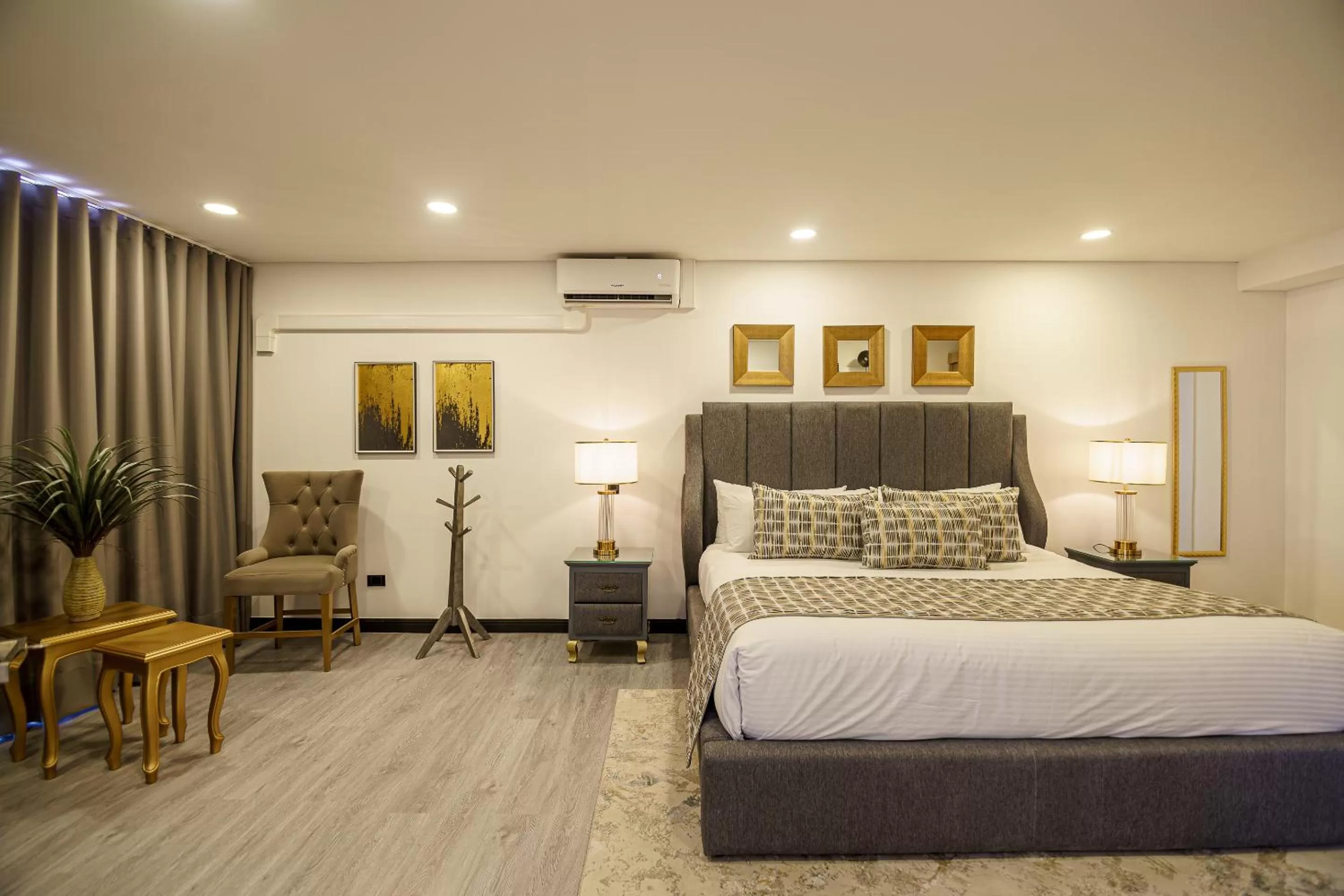 Photo of the whole room, Bed in First Class Hotel