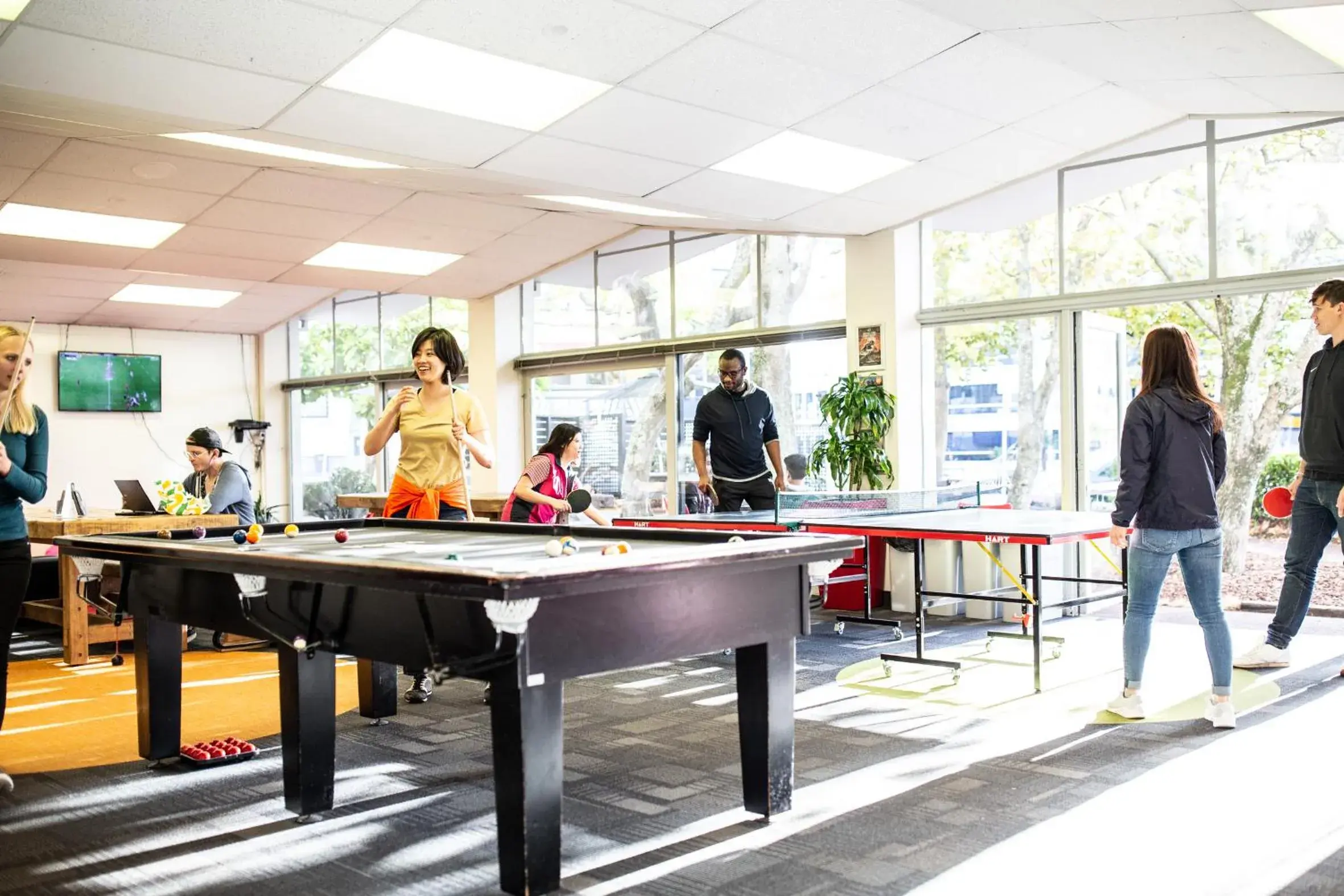 Communal lounge/ TV room, Billiards in YMCA Hostel