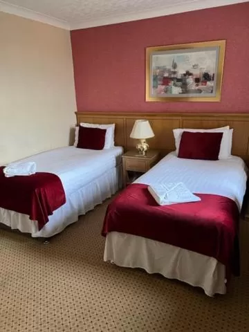 Bed in Caledonian Hotel