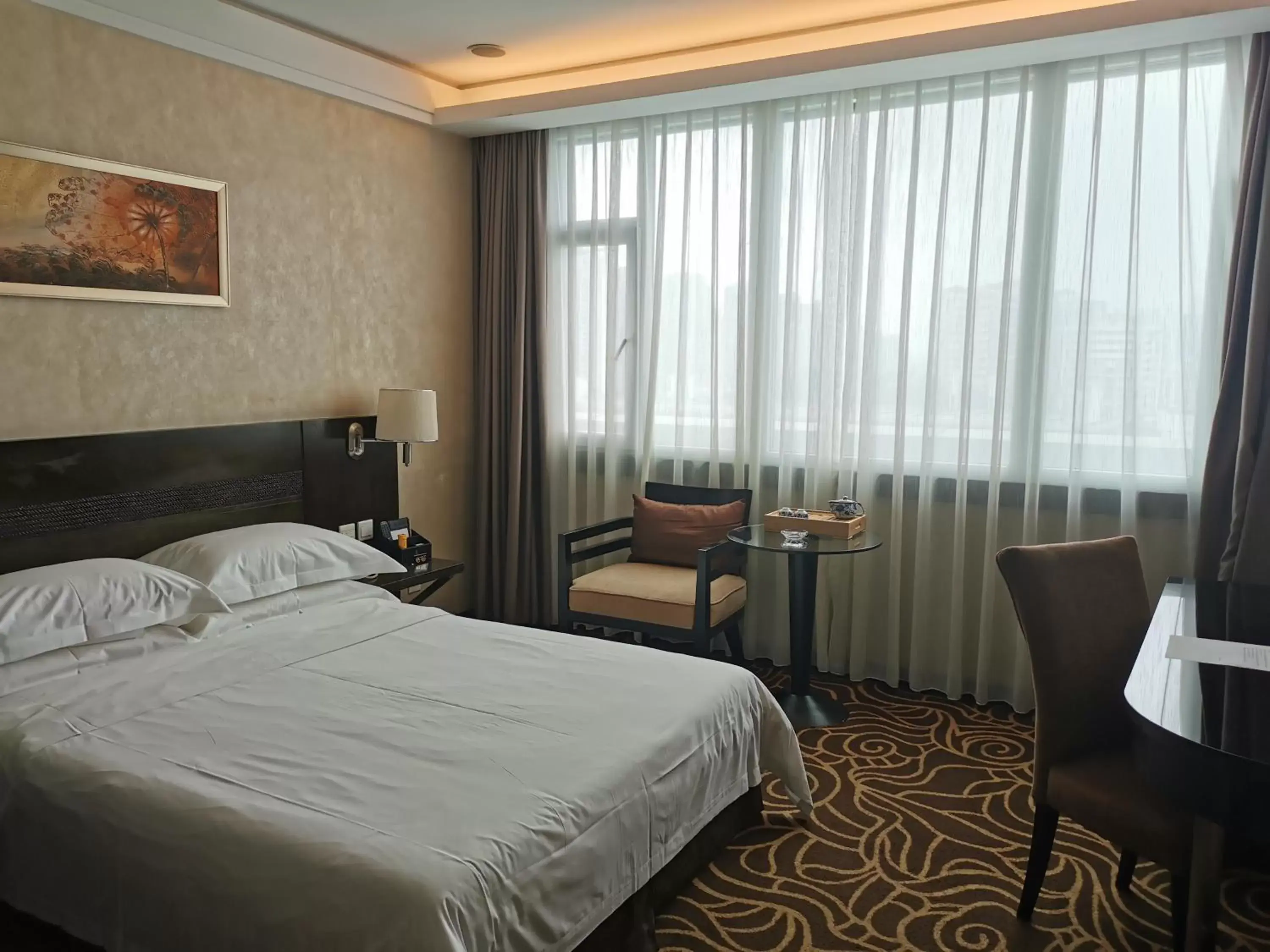 Photo of the whole room, Bed in Hua Shi Hotel