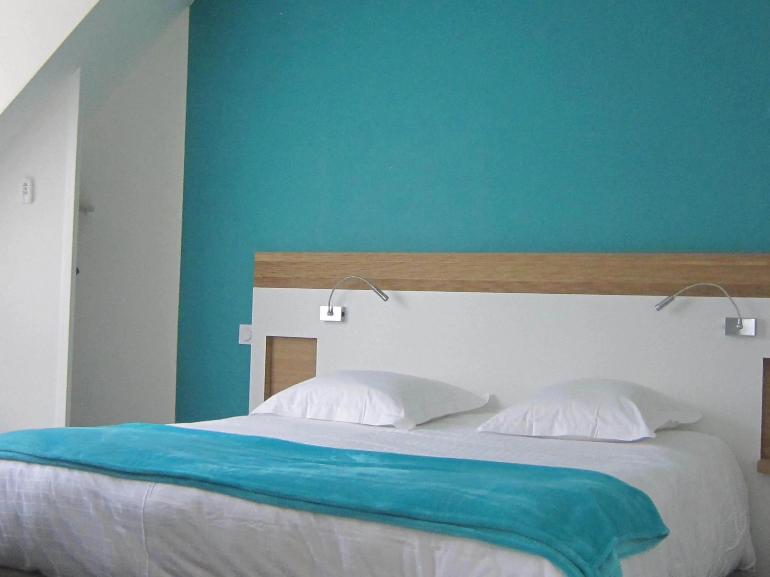 Bed in Hôtel de Perros, The Originals Boutique