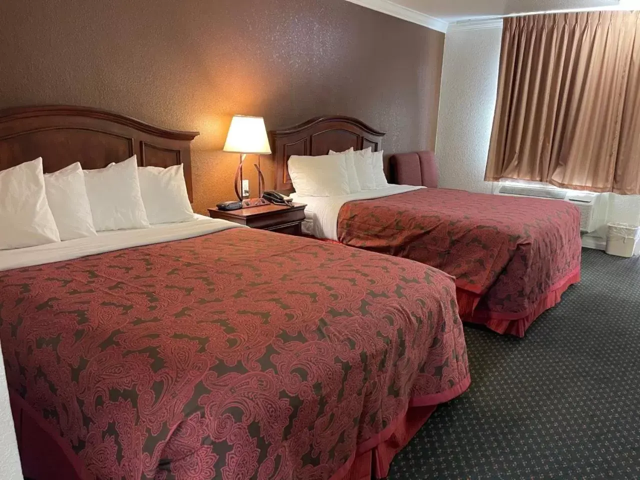 Bed in 1st Interstate Inn