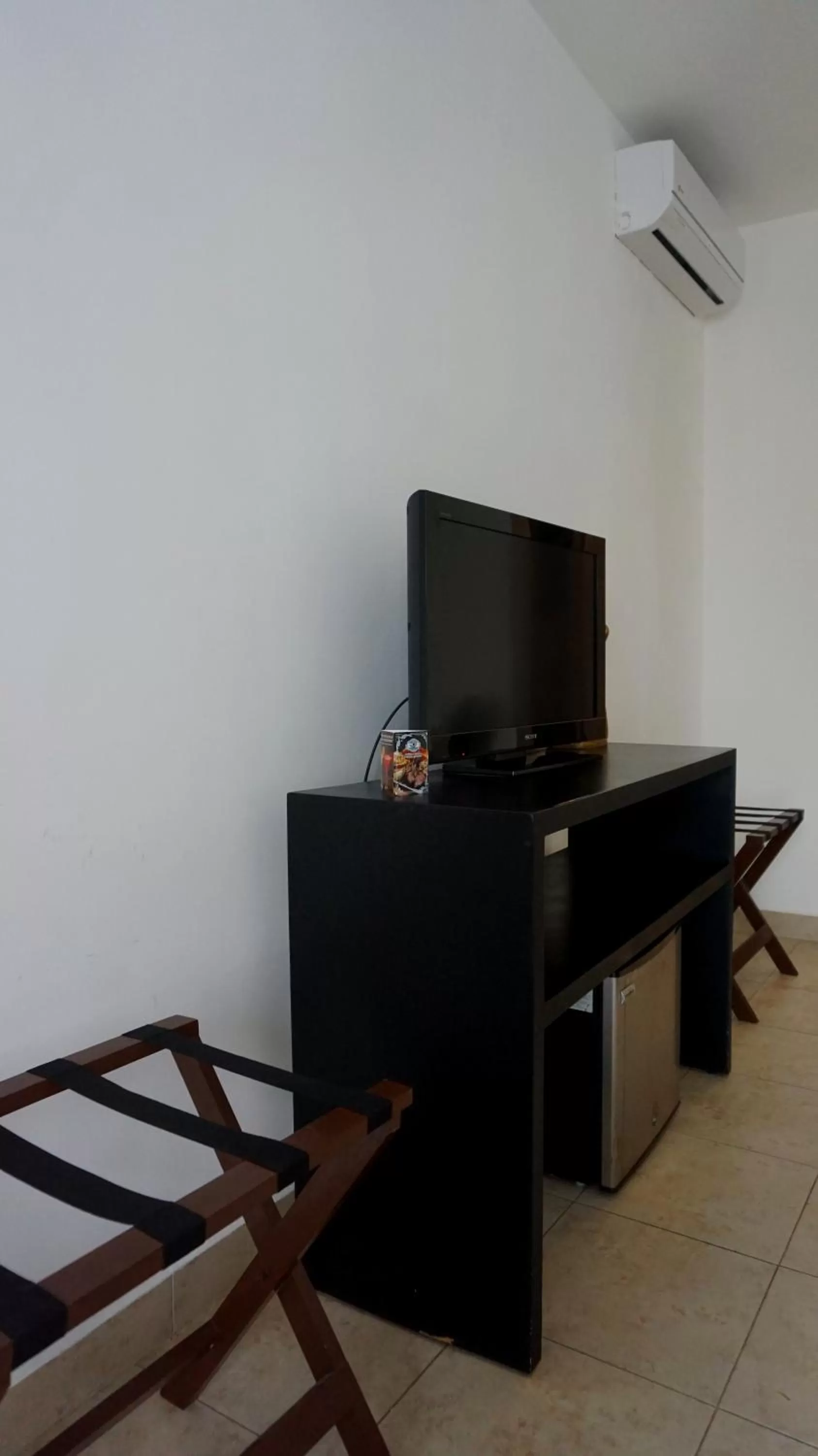 TV and multimedia, TV/Entertainment Center in Casa Ticul Hotel Boutique - 5Th Ave by BFH