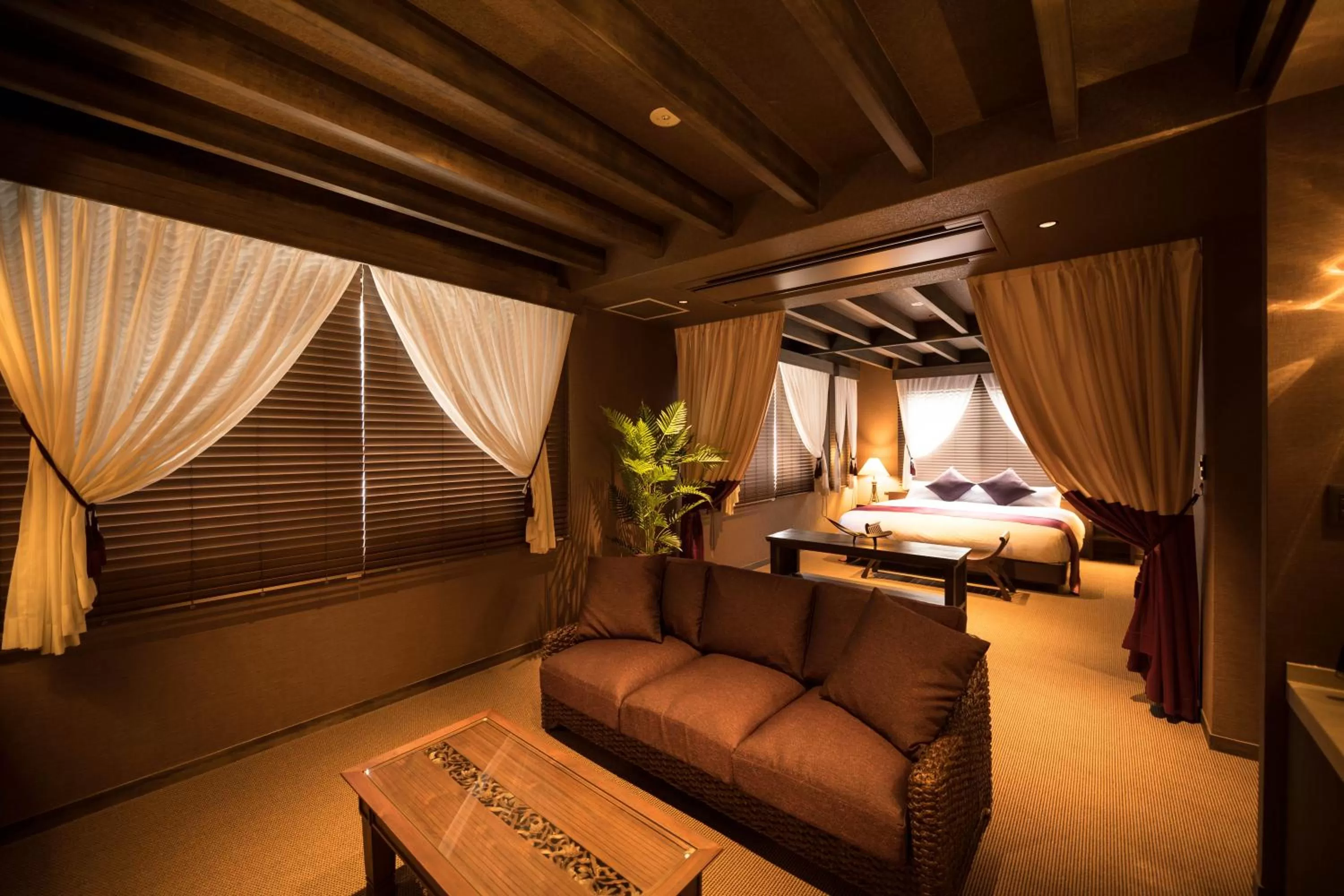 Living room, Bed in HOTEL SHIKISAI KYOTO