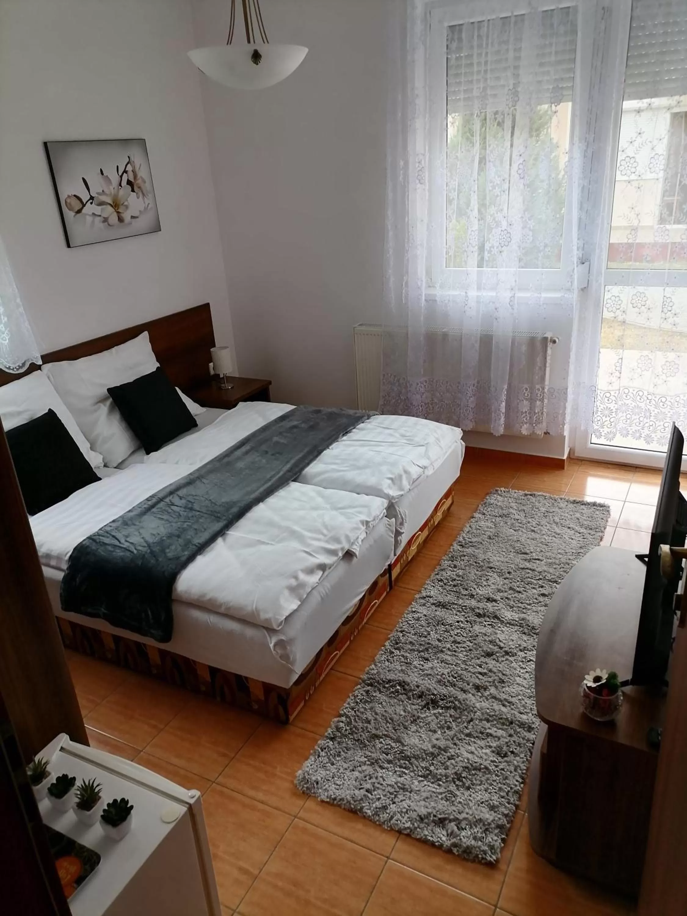 Bed in Aqua Oazis Apartman