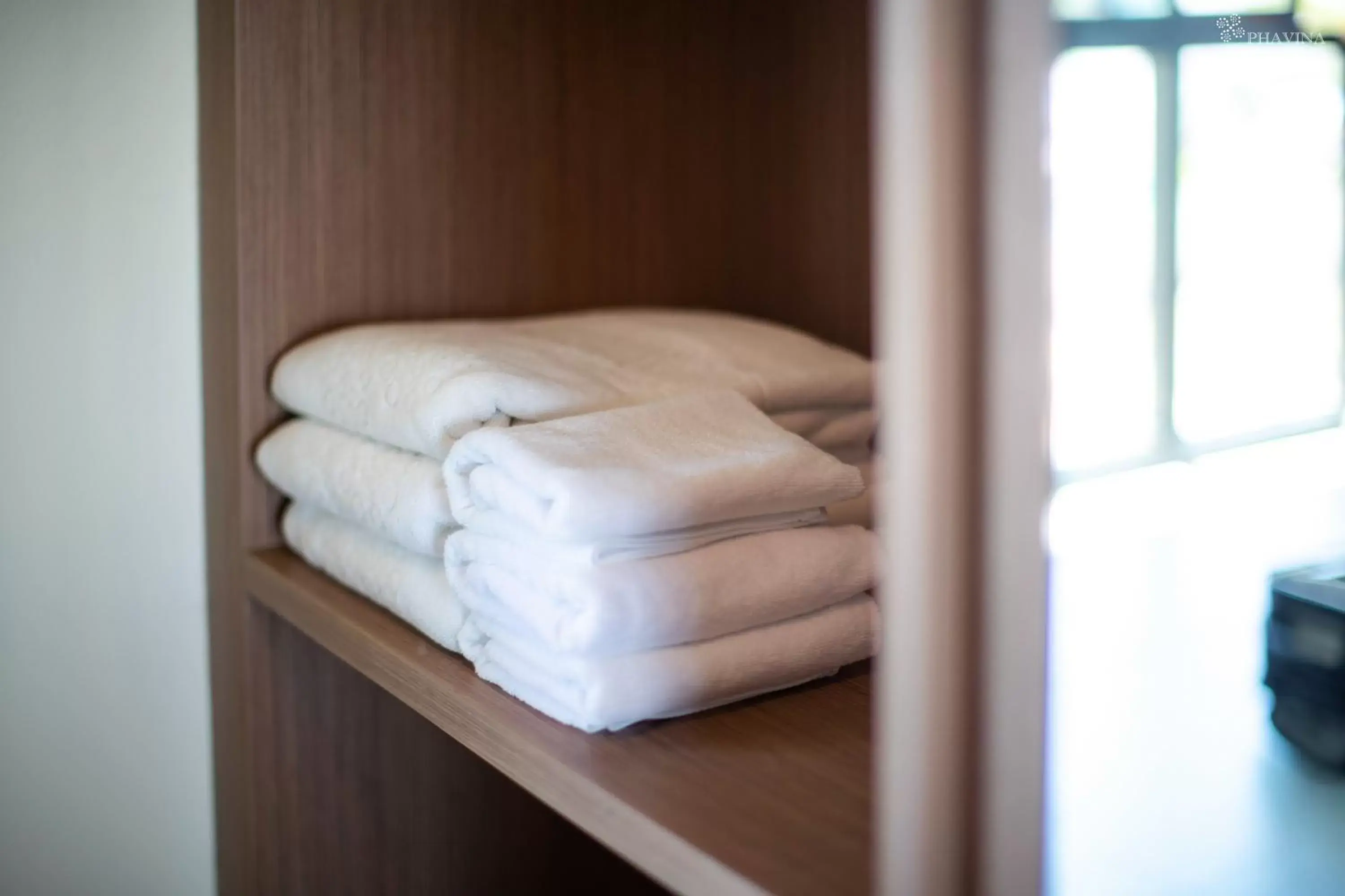 towels, Bed in Phavina Grand Boutique