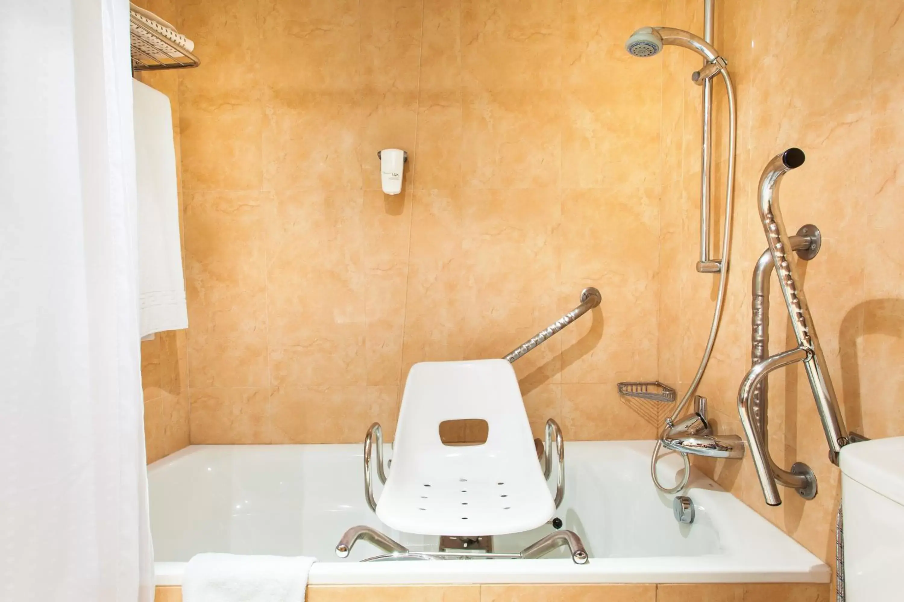 Facility for disabled guests, Bathroom in Holiday Inn Lisbon-Continental, an IHG Hotel