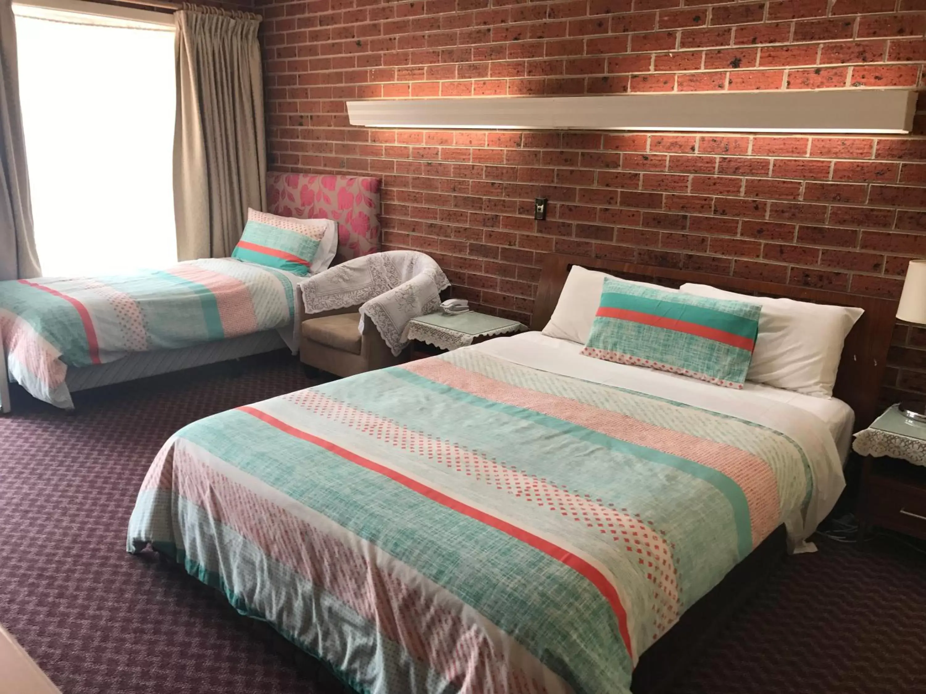 Bed in Carnegie Motor Inn