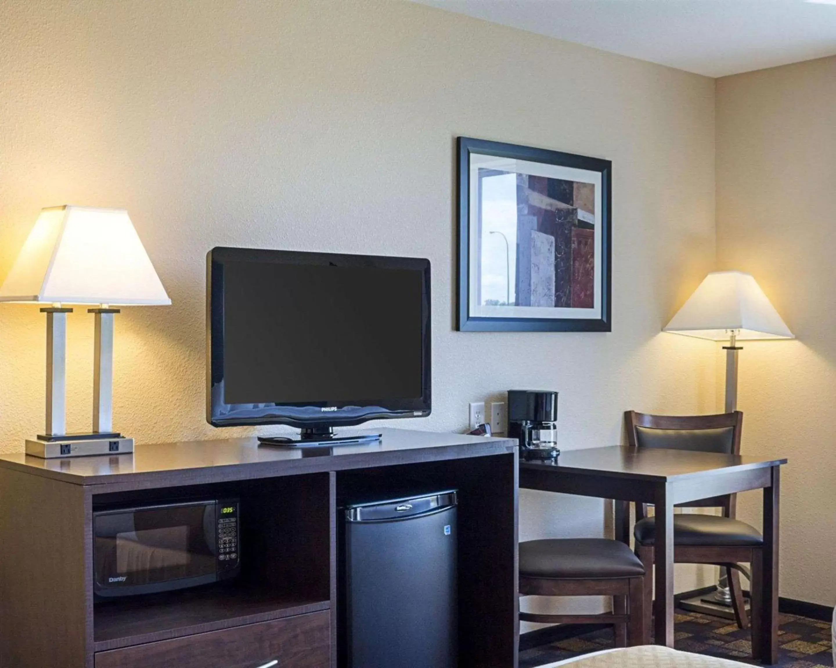 Photo of the whole room, TV/Entertainment Center in Quality Inn & Suites