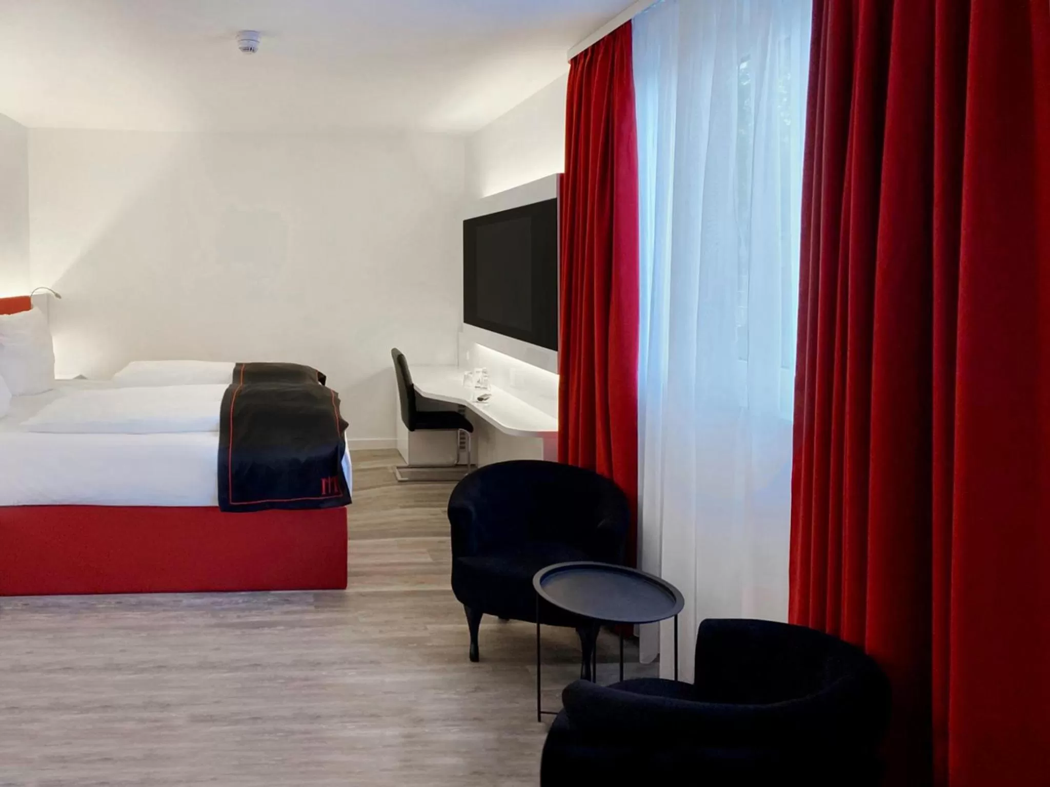 Photo of the whole room, Bed in DORMERO Hotel Darmstadt