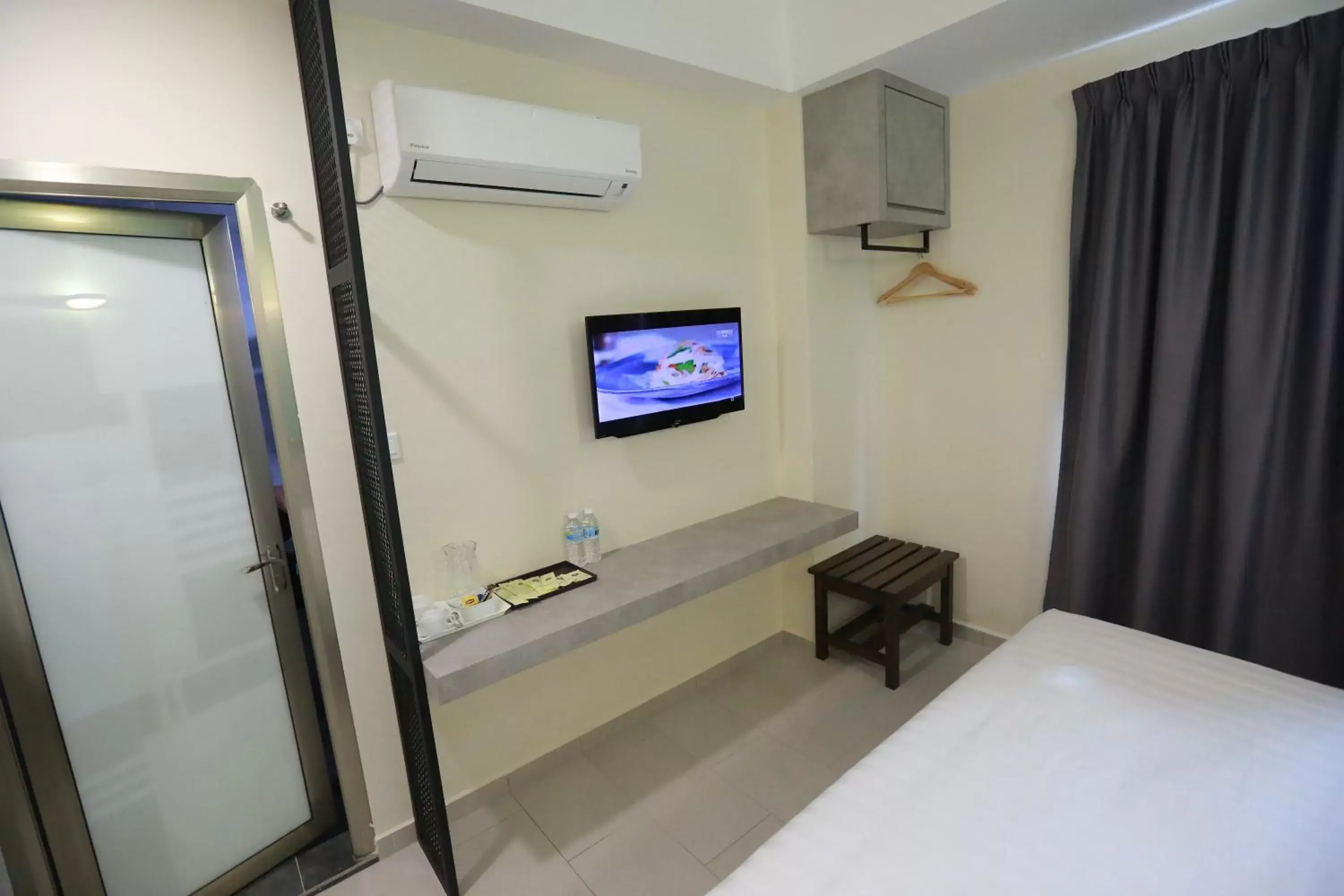 TV/Entertainment Center in Pantai Regal Hotel