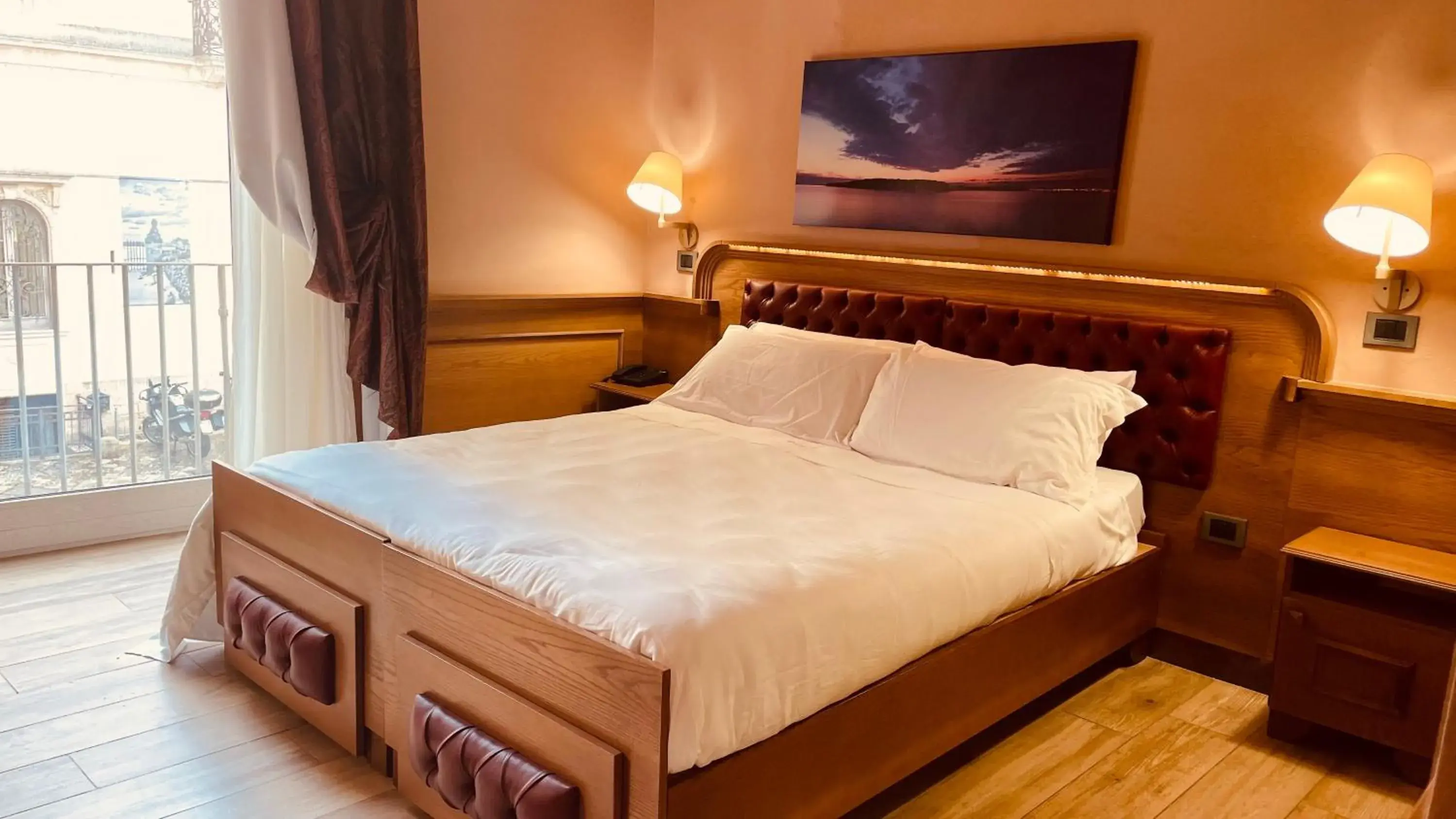 Bed in Le Club Boutique Hotel