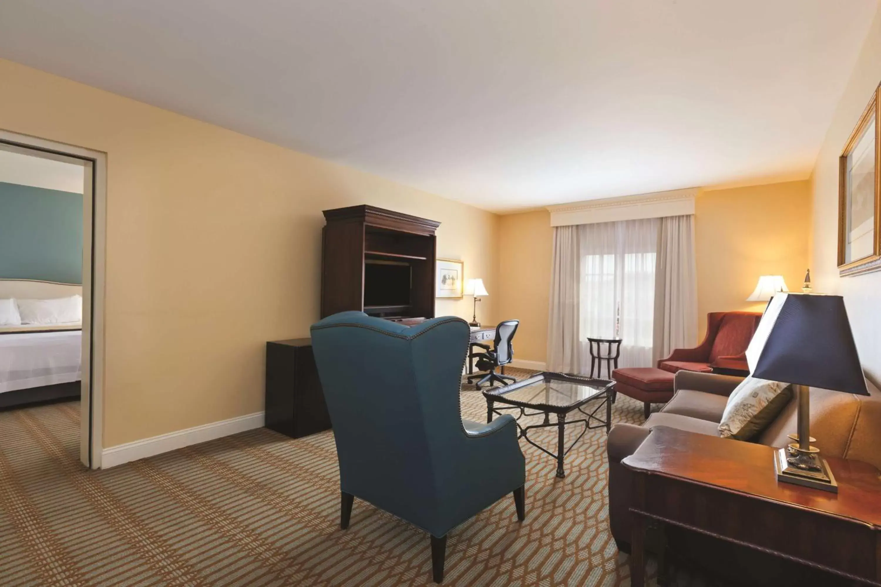 Bedroom, Seating Area in Virginia Crossings Hotel, Tapestry Collection by Hilton