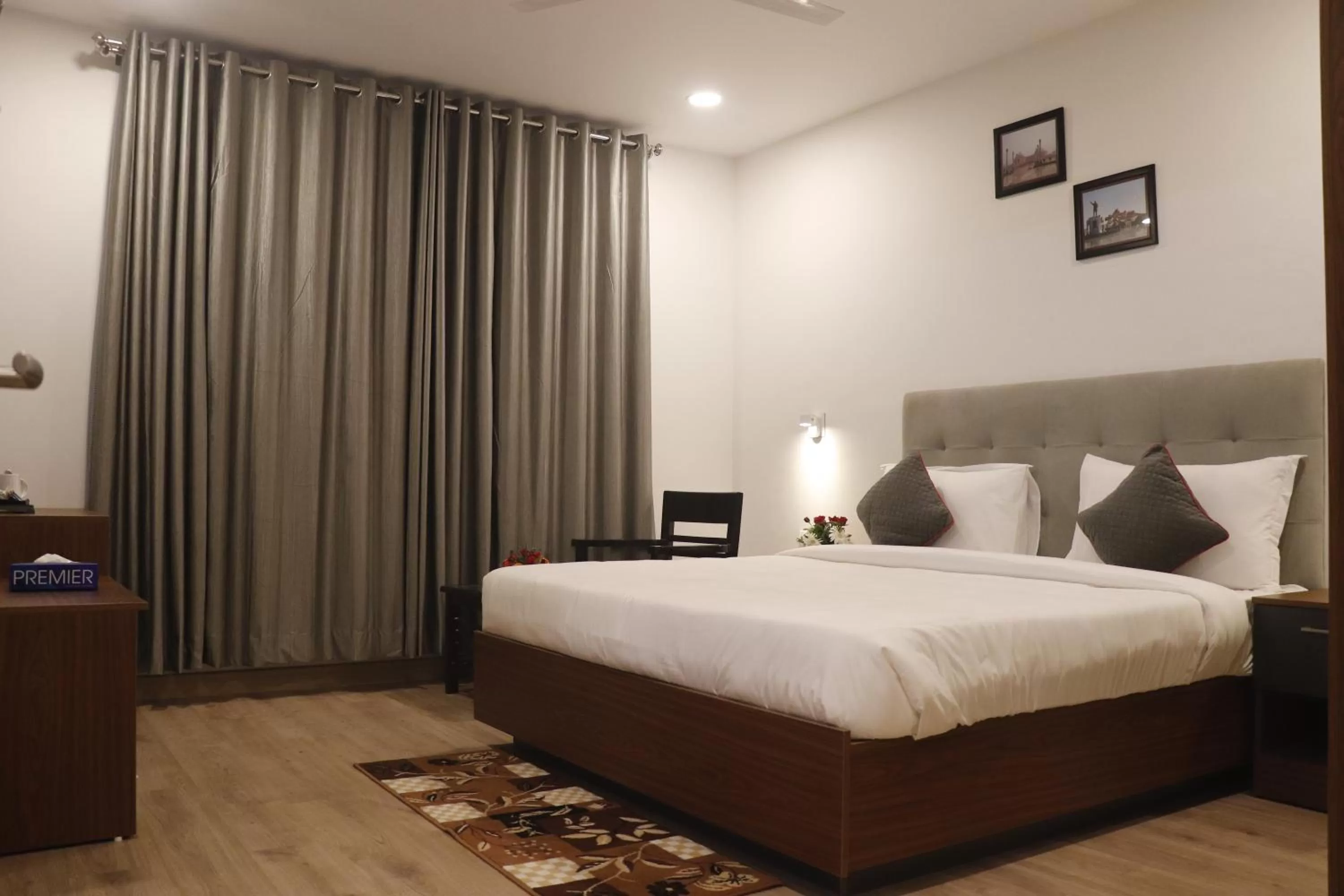 Photo of the whole room, Bed in Click Hotel Transport Nagar