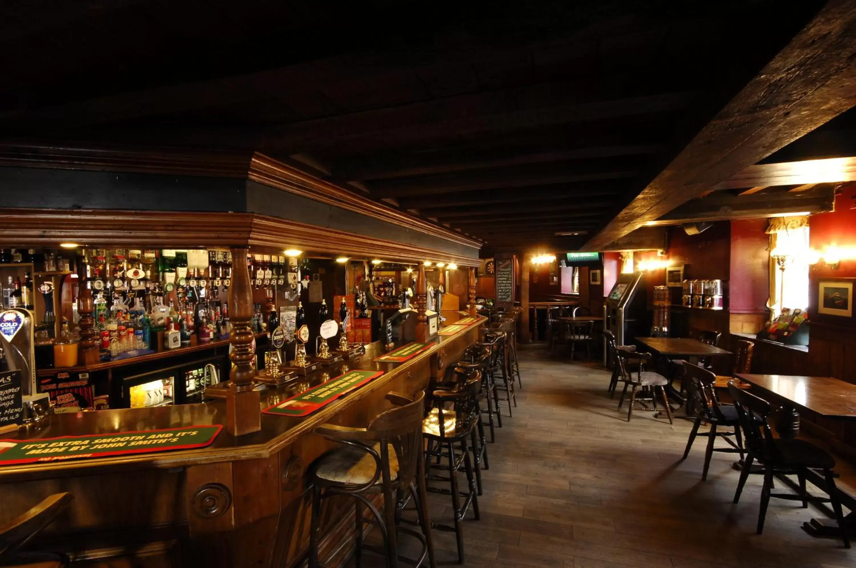 Lounge or bar in The Longboat Inn Lounge or bar in The Longboat Inn