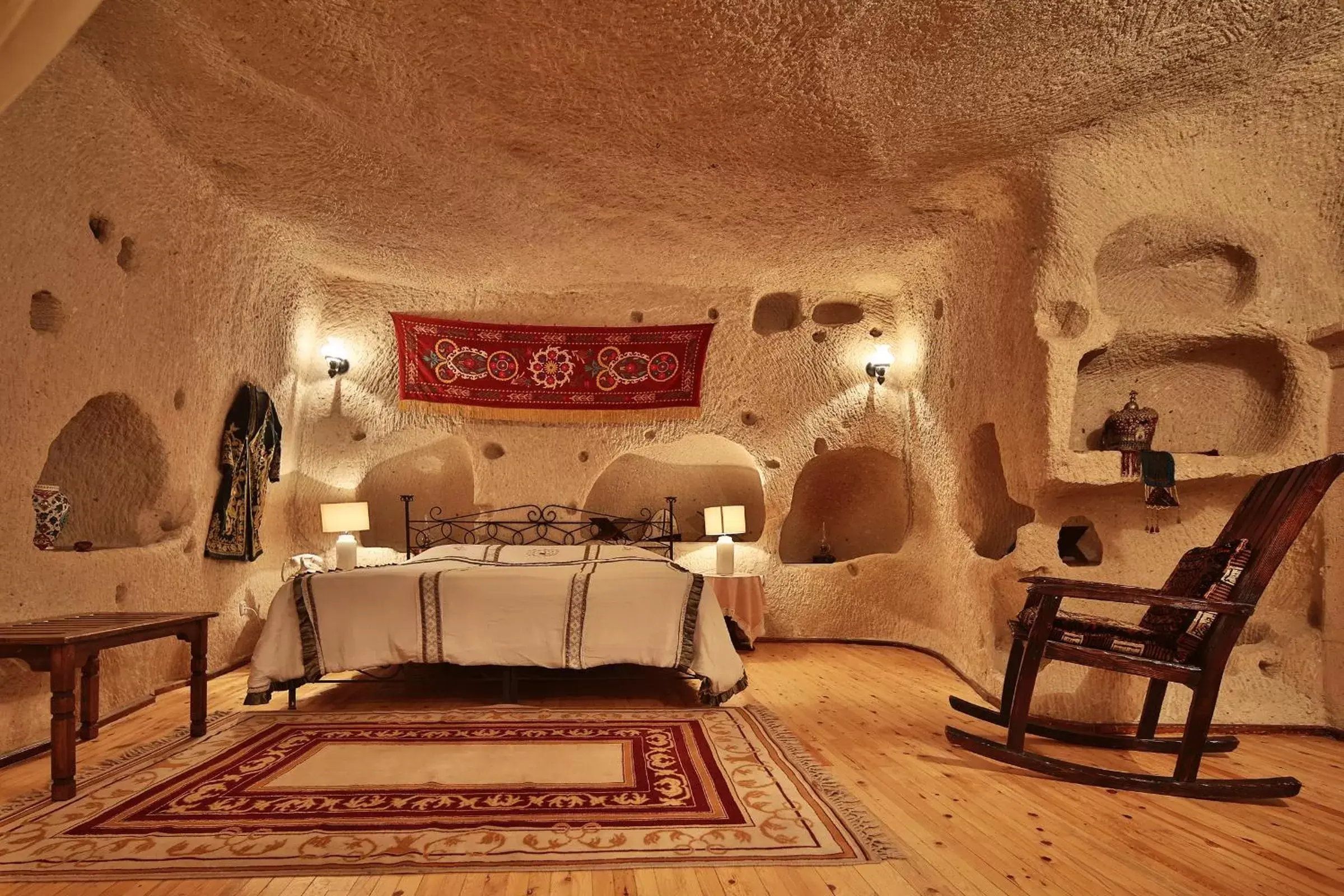 Bed, Seating Area in Cappadocia Cave Suites