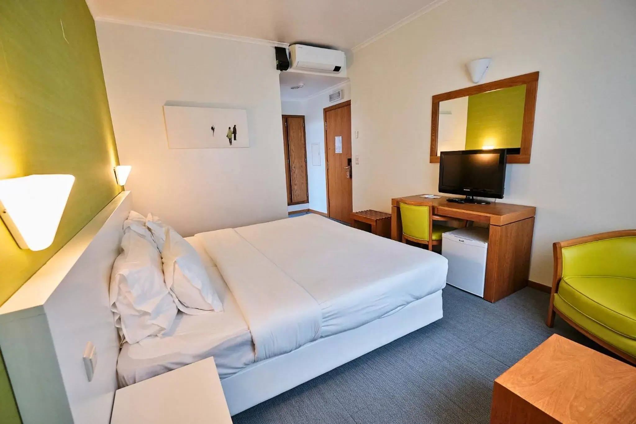 Bed in Hotel Varandas do Atlântico by RIDAN Hotels Bed in Hotel Varandas do Atlântico by RIDAN Hotels