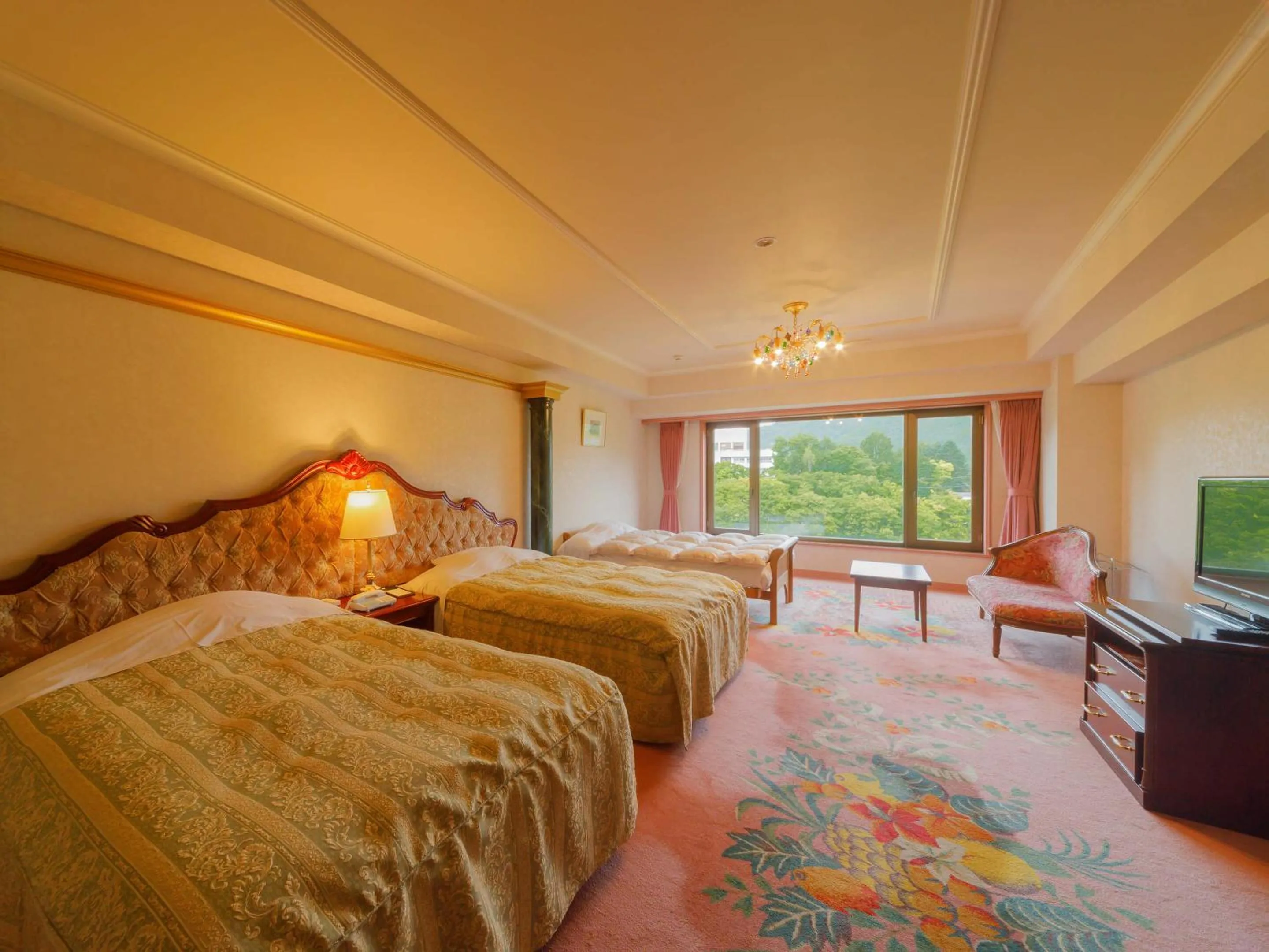 Living room, Bed in Jozankei View Hotel