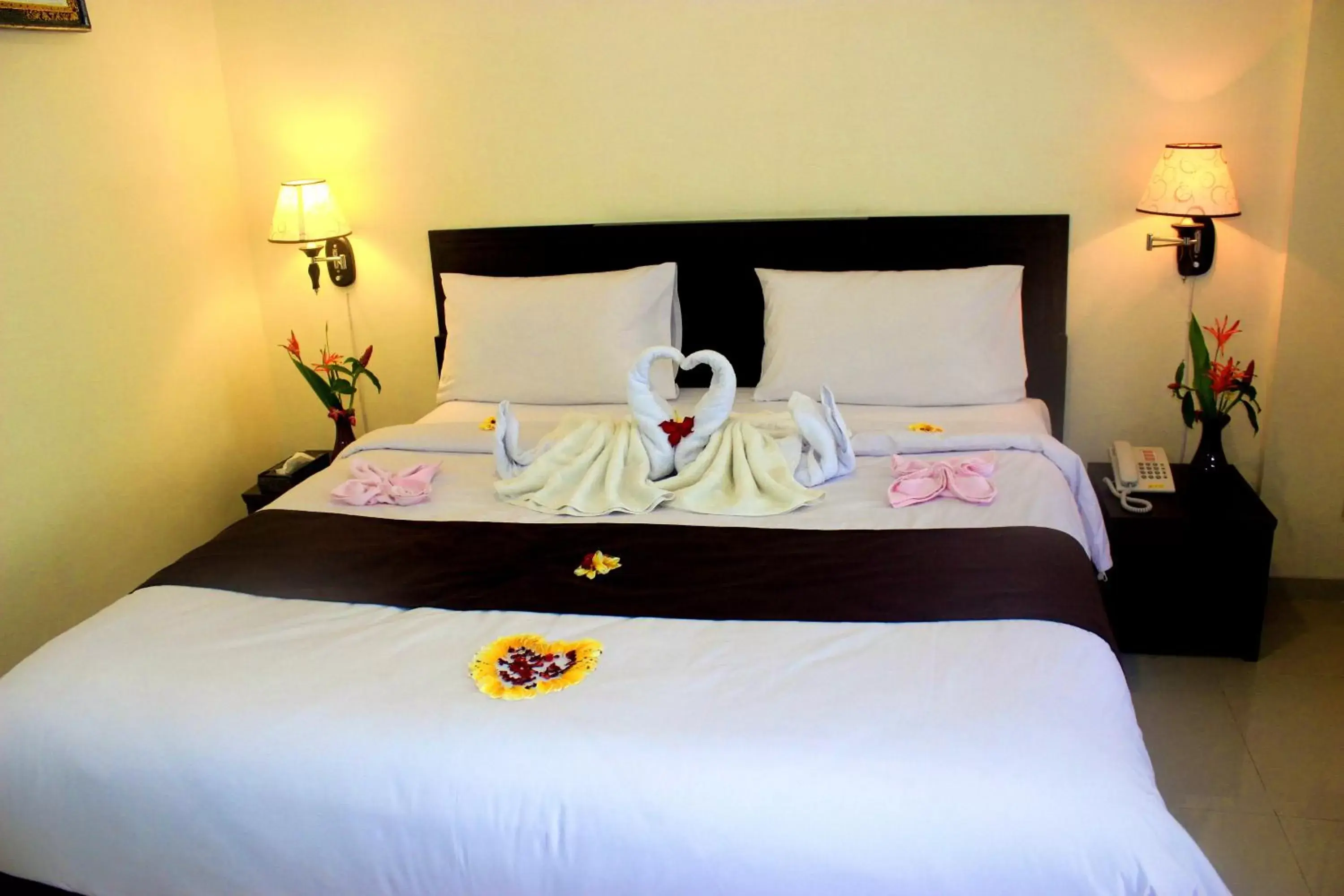 Bathroom, Bed in Manggar Indonesia Hotel